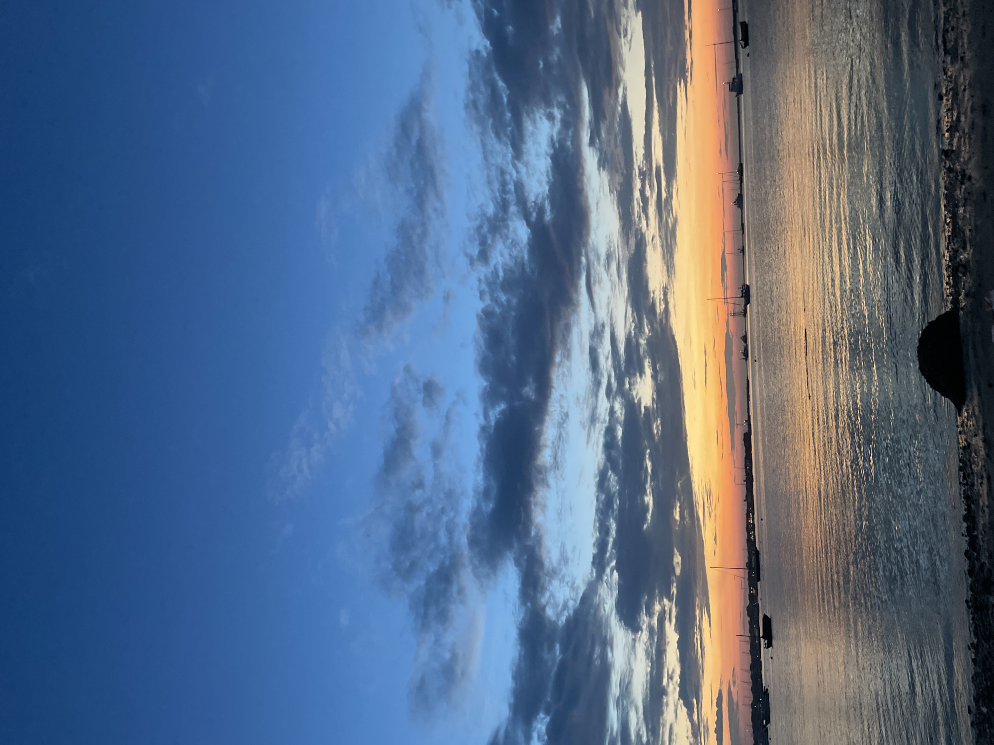Nantucket waterfront glows at sunset