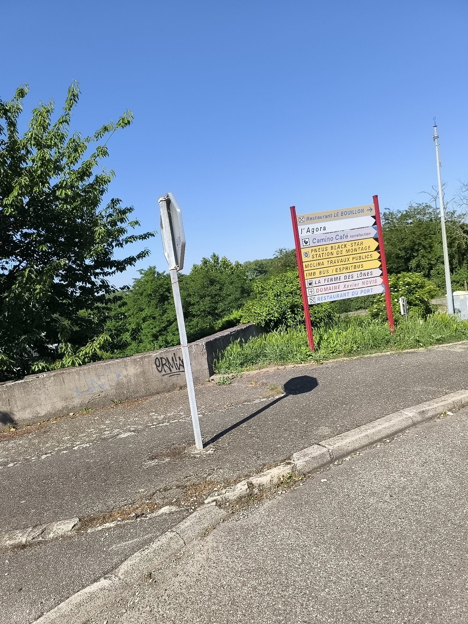 Street views captured in Saint-Pierre-de-Bœuf on sunny afternoon