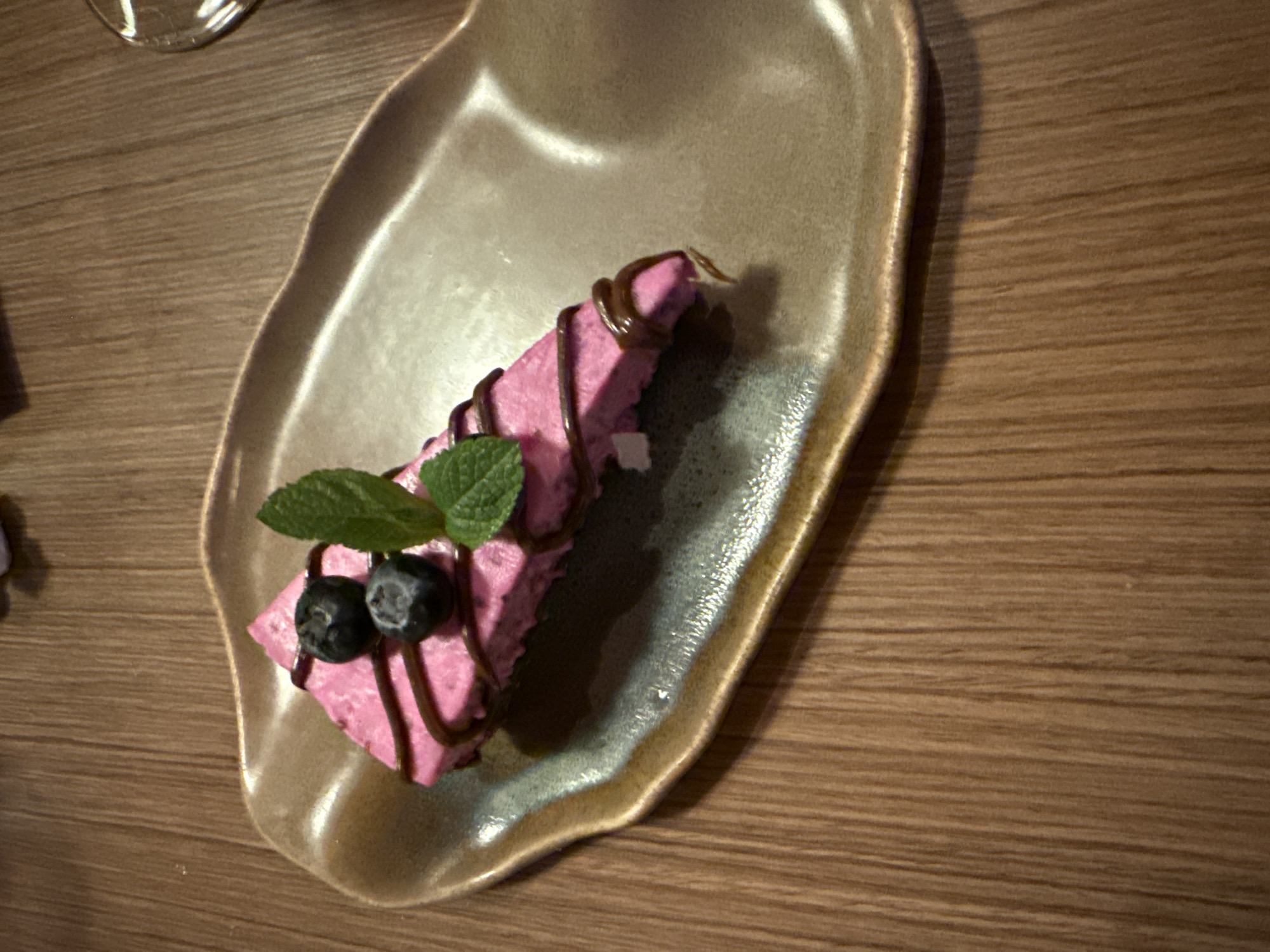 Restaurant meal documented in Sofia featuring steak, dessert, bread