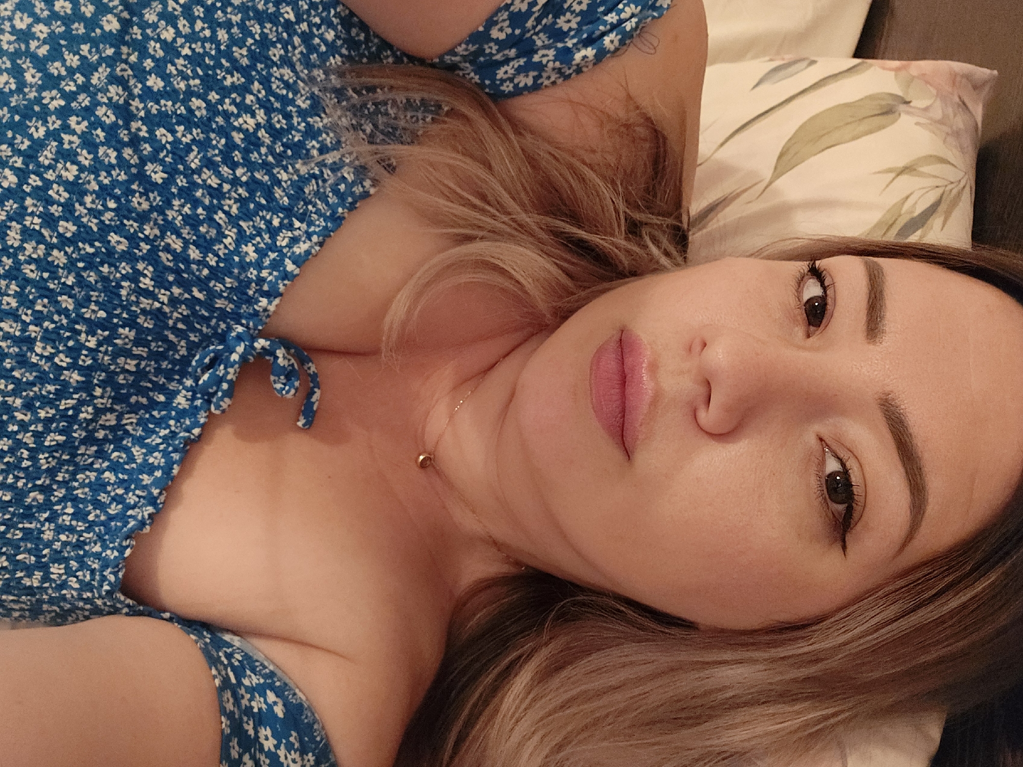 Relaxed indoor selfies taken lying down, Karlstadt