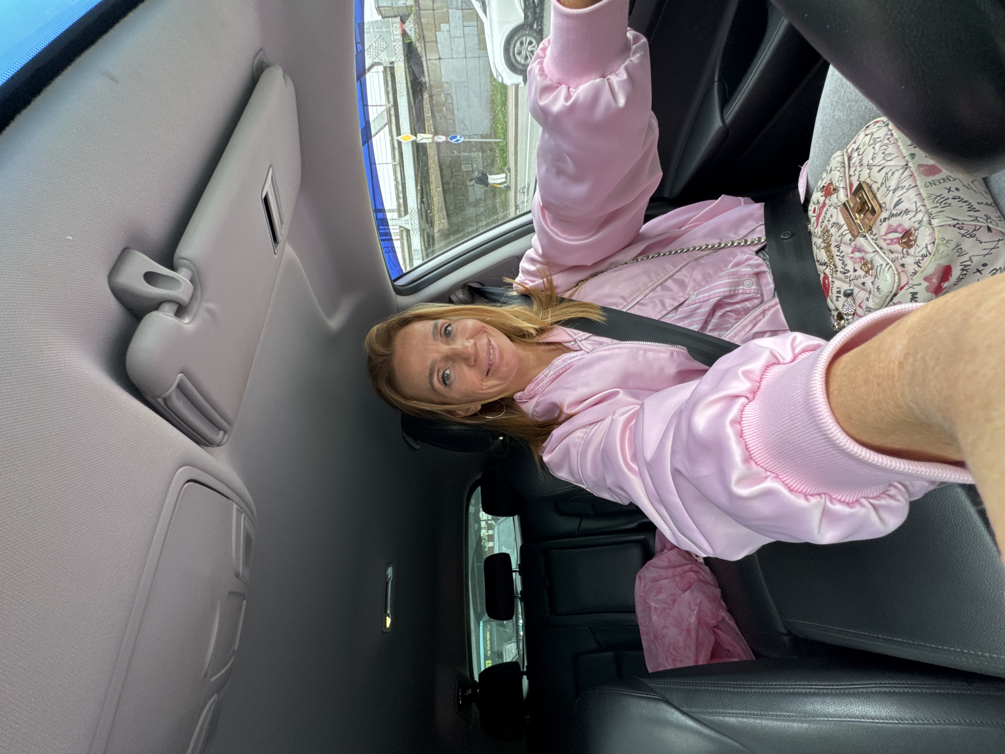 Woman takes selfie in car in Saint Petersburg