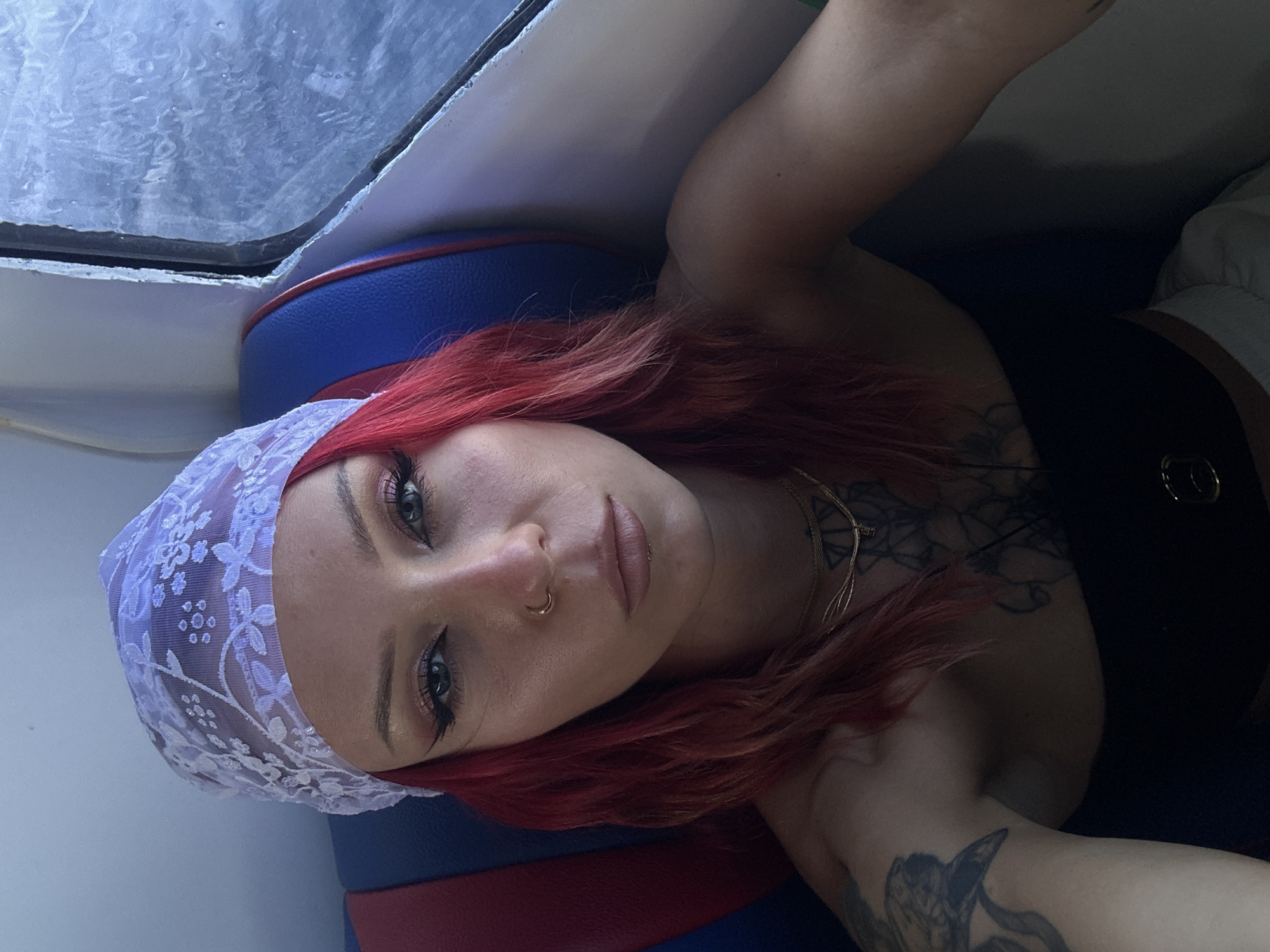 Woman takes selfie in vehicle near Nusa Penida