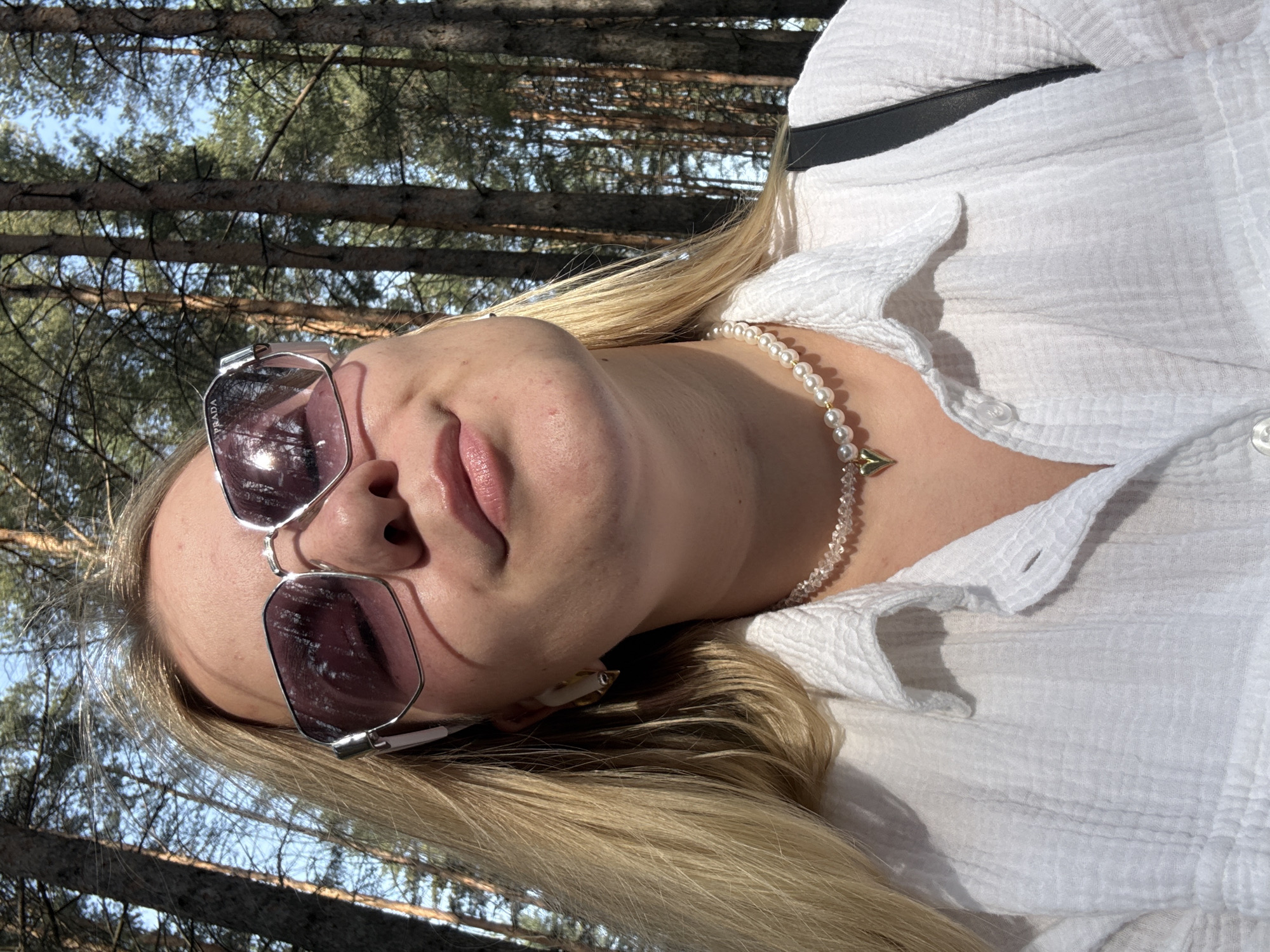 Woman poses for forest selfies in Chaikovsky, Russia
