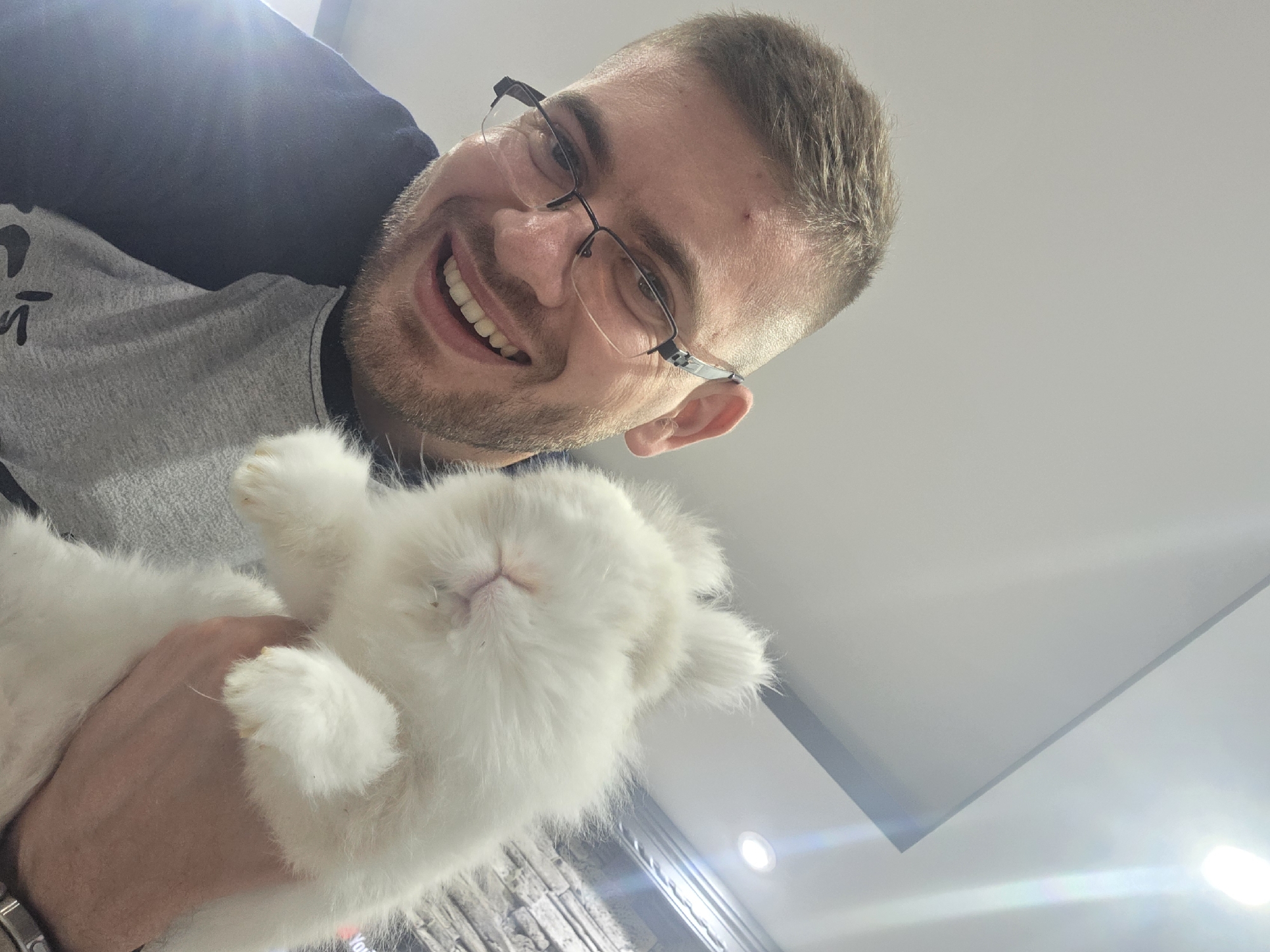 Man documents quiet afternoon with pet rabbit in Bulgarian village