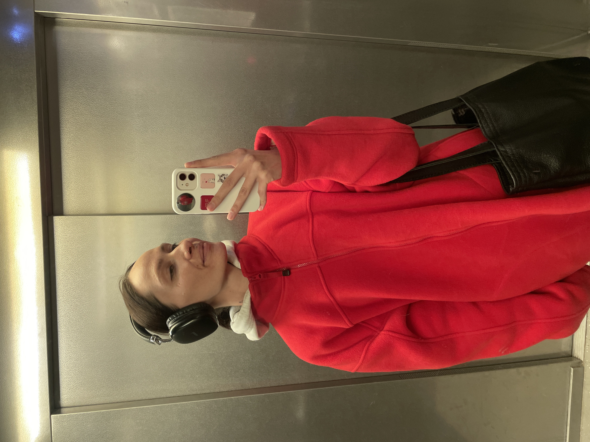 Woman takes elevator selfie in Izhevsk