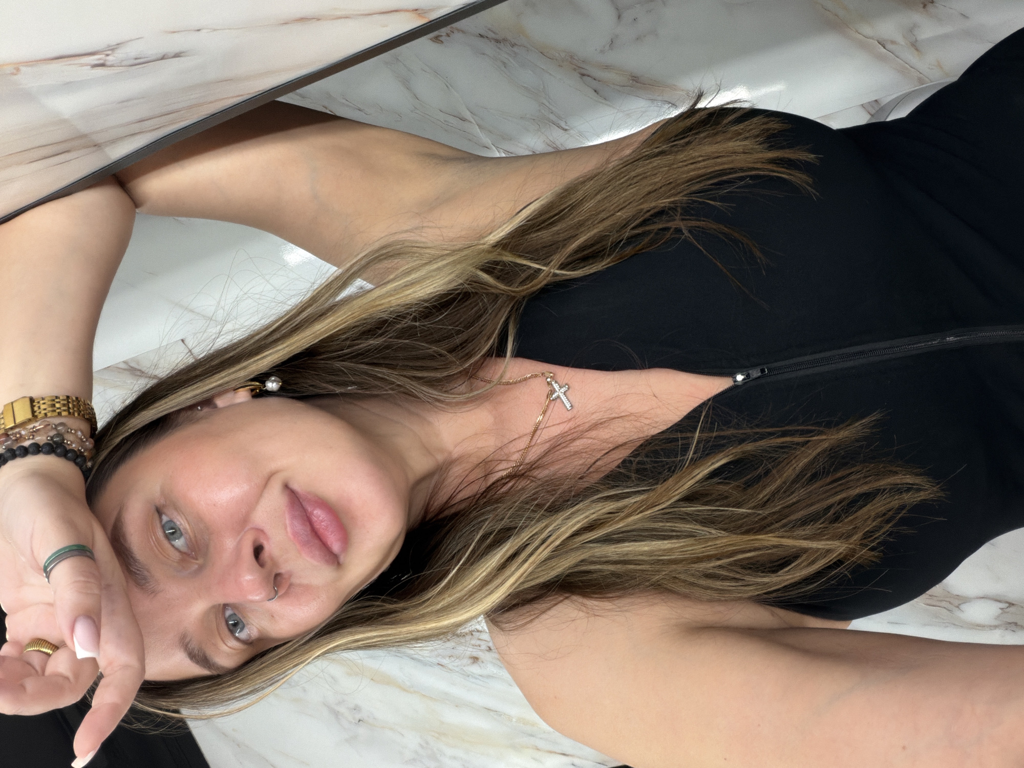 Woman Takes Multiple Selfies in Moscow Interior Location