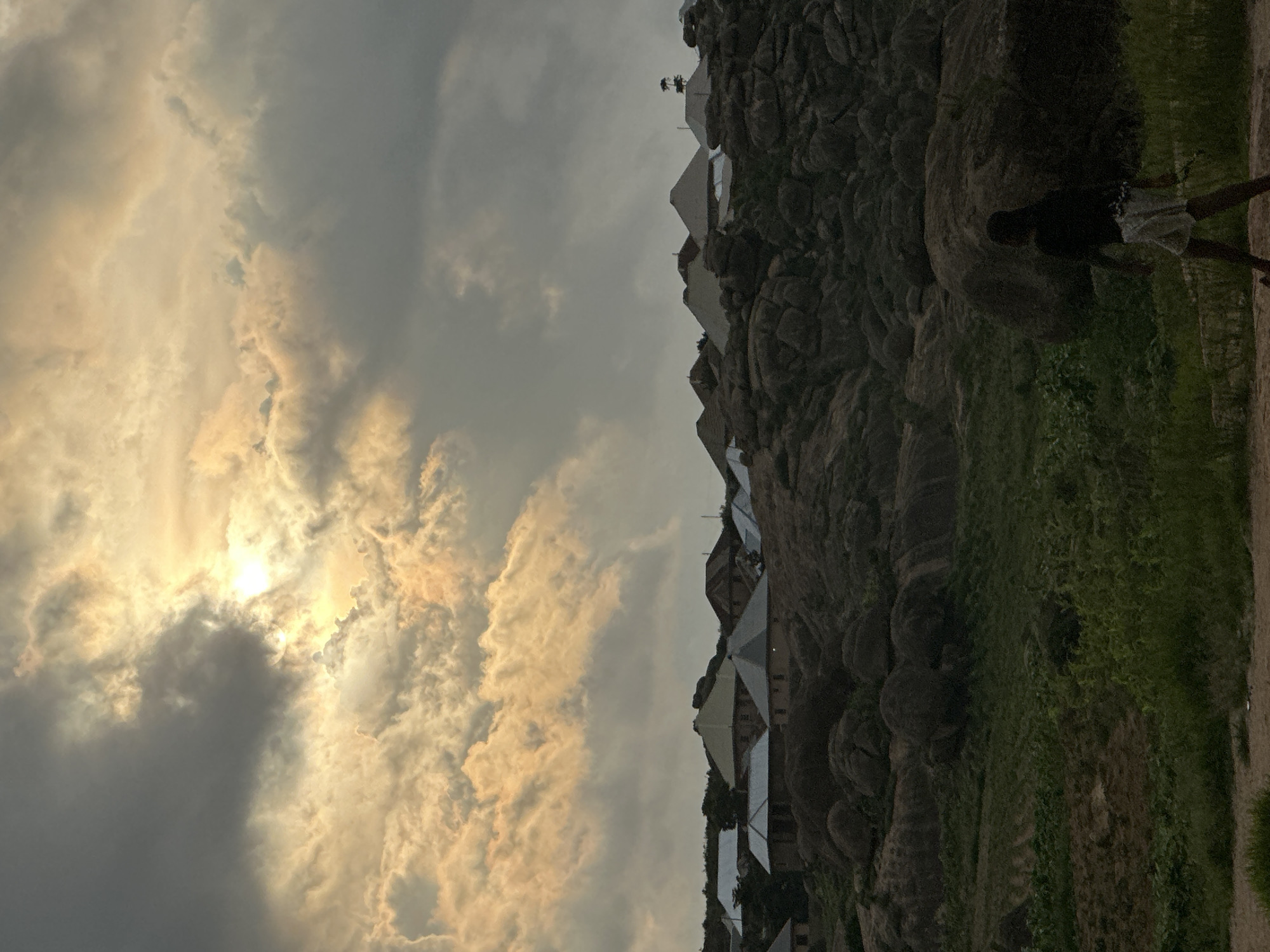 Boulders, clouds, and village life on the Jos Plateau