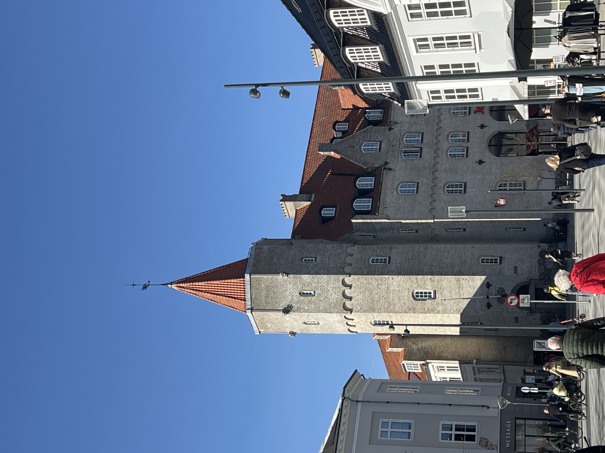 Historical Aalborg architecture documented under clear April skies