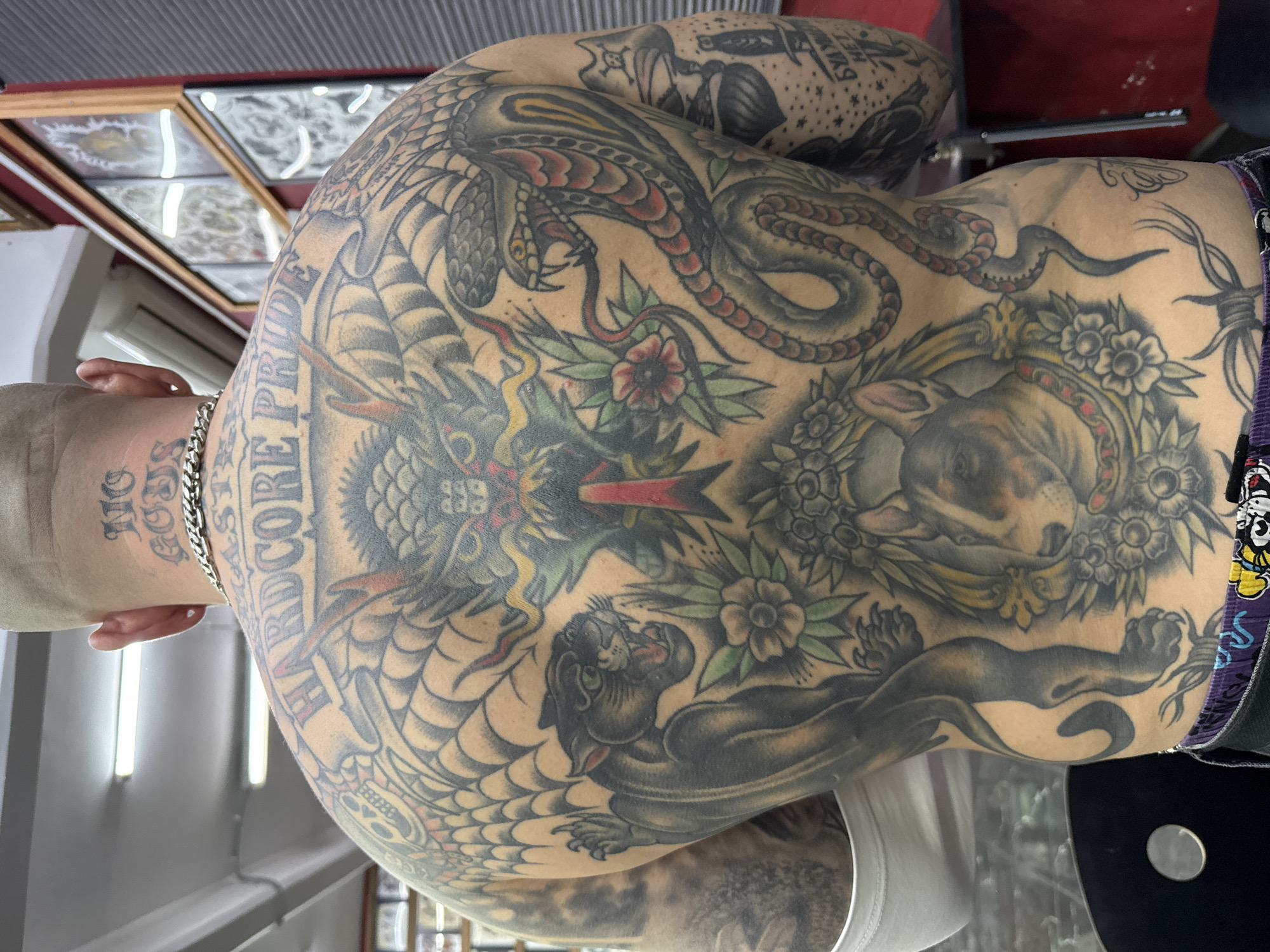 Heavily tattooed person observed in Moscow displaying extensive body art