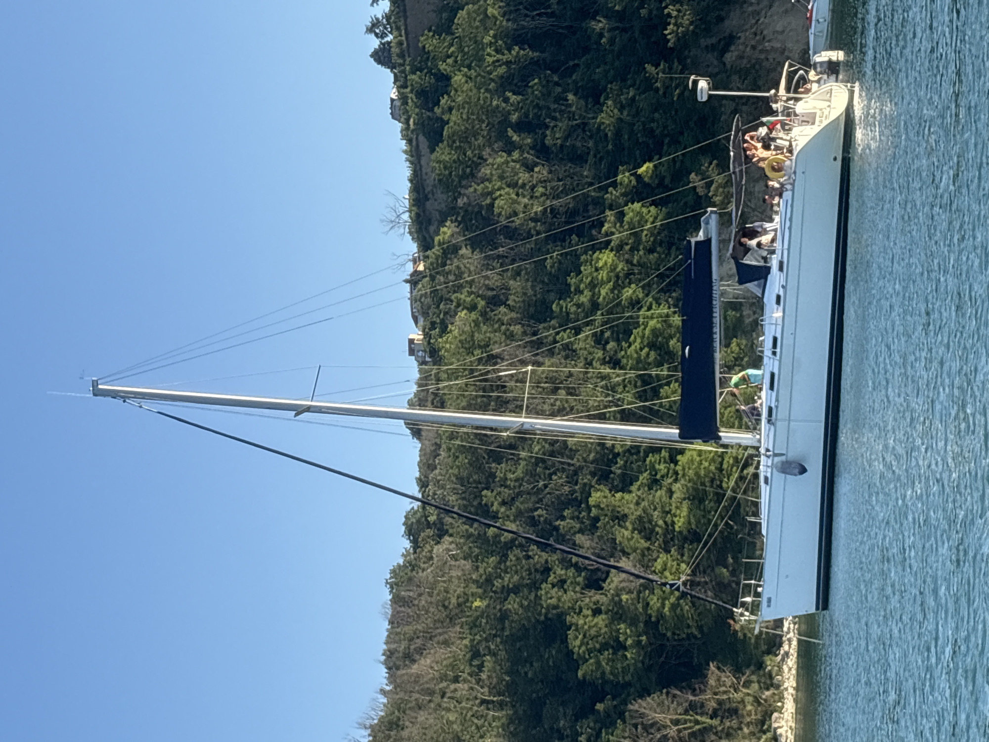 Afternoon on the water: sailboats, paddleboards, and a sunset wedding