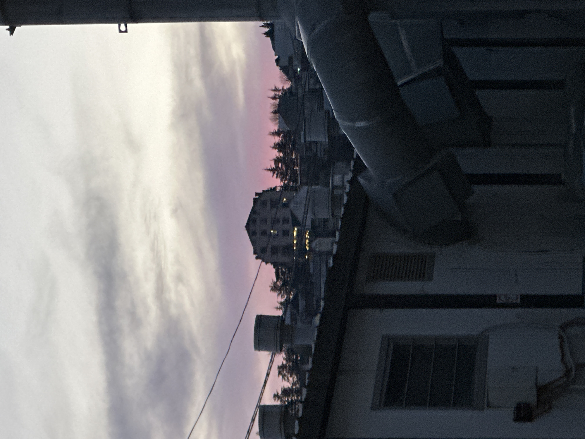 Evening street scene photographed from rooftop in Sochi, Russia