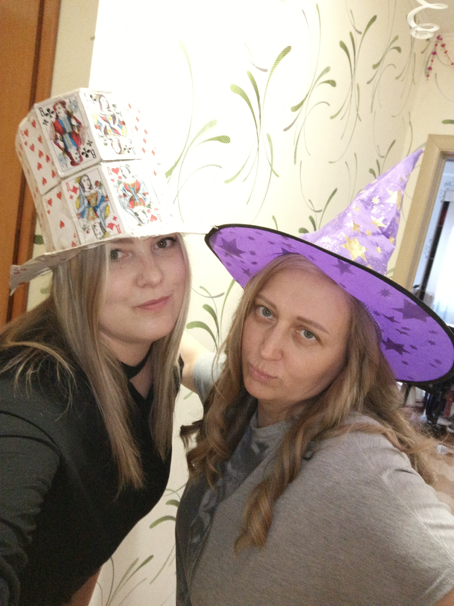 Women pose with costume accessories in Марковский, Russia