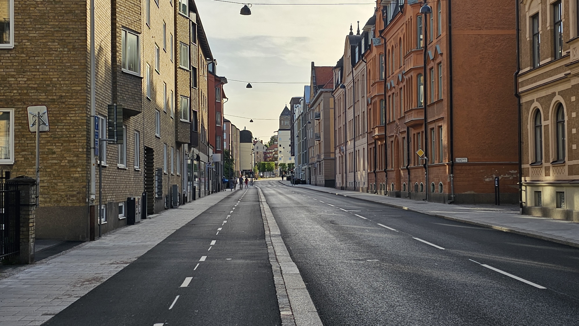 Cobblestone street and historic facades in central Linköping