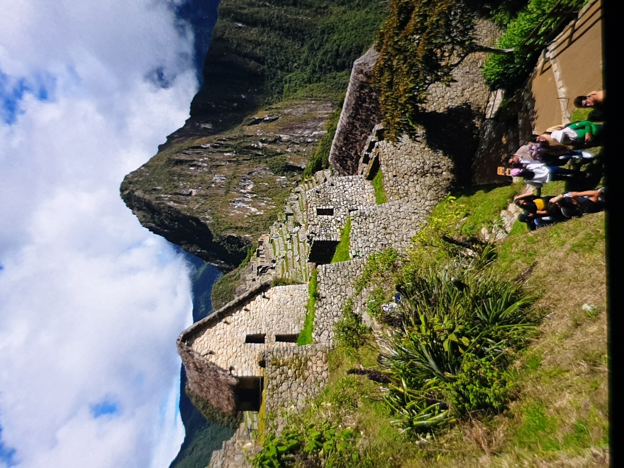 Tourist documents Machu Picchu citadel views in Peru mountains