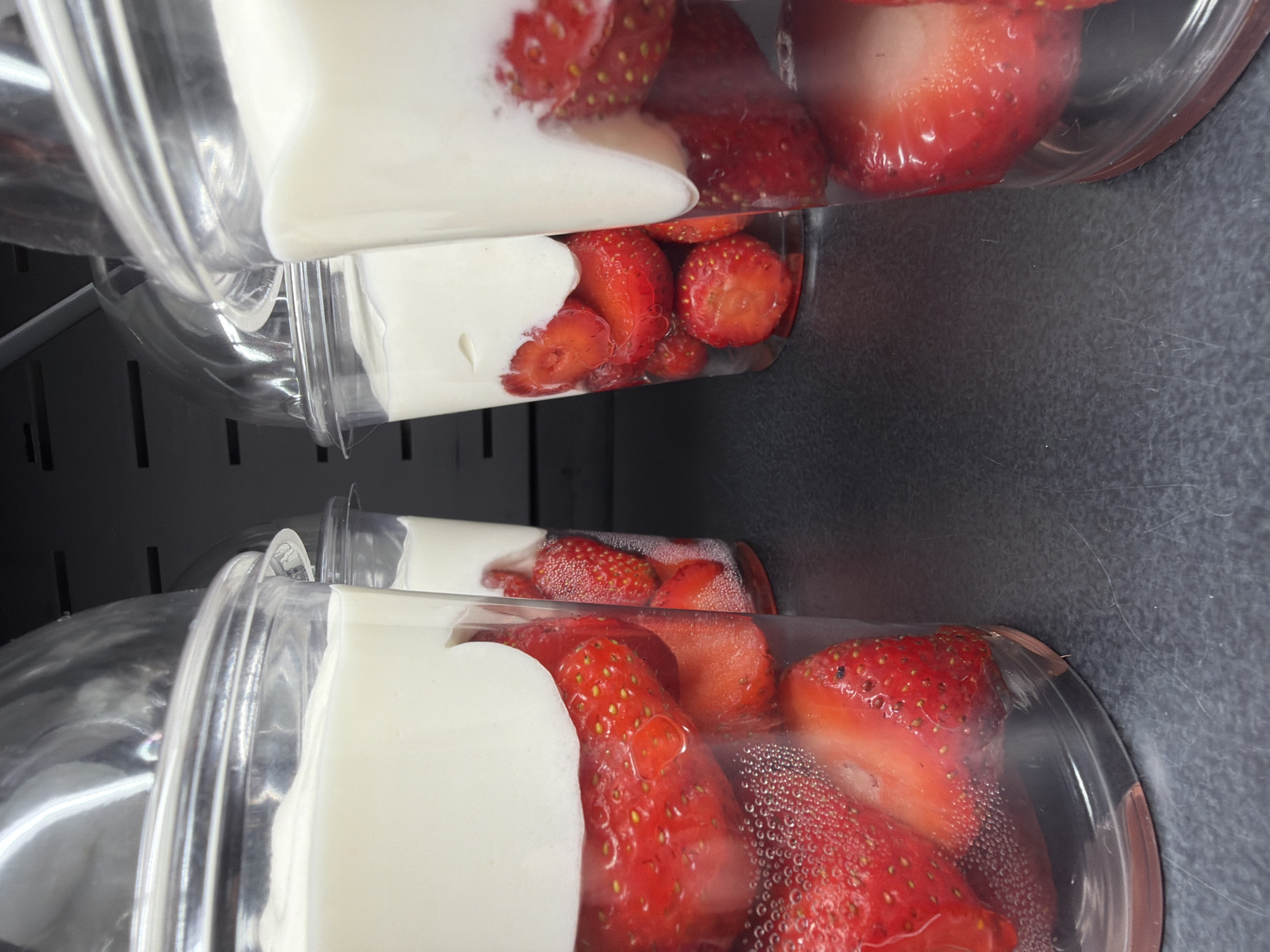 Fresh strawberry desserts and seedlings at a Saint Petersburg café