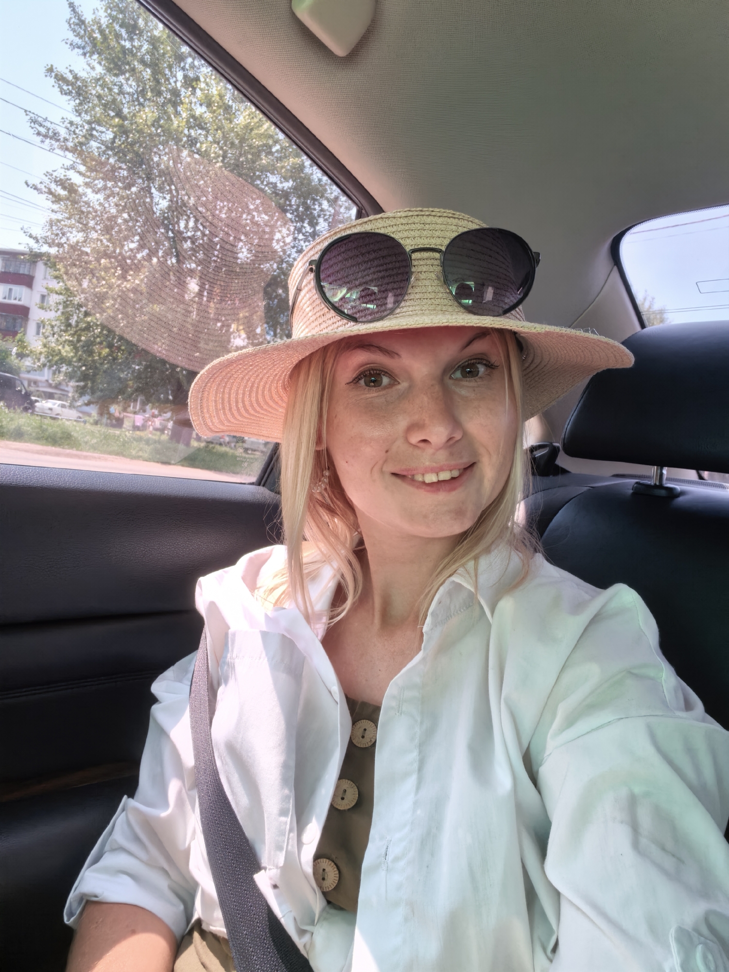 Backseat selfie moment during a car ride through Sterlitamak