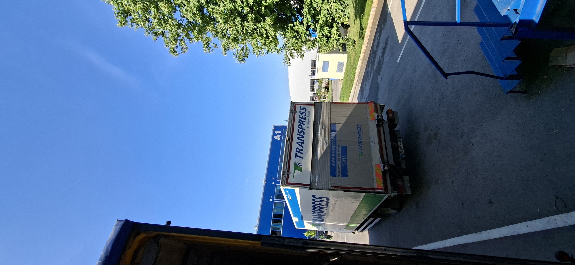 Trucks and warehouse at a Varna industrial site