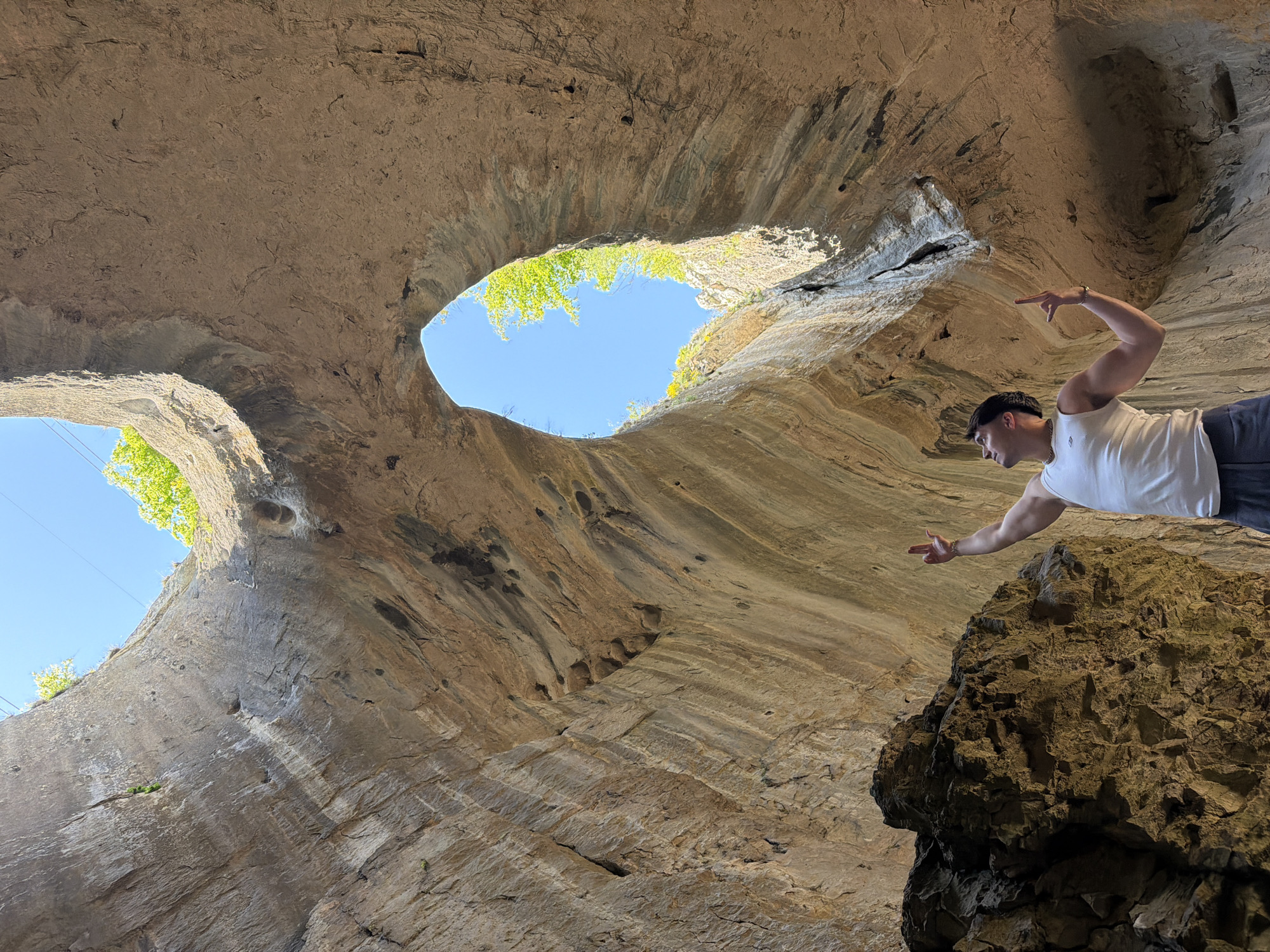 Man visits cave with dual sky openings in Karlukovo