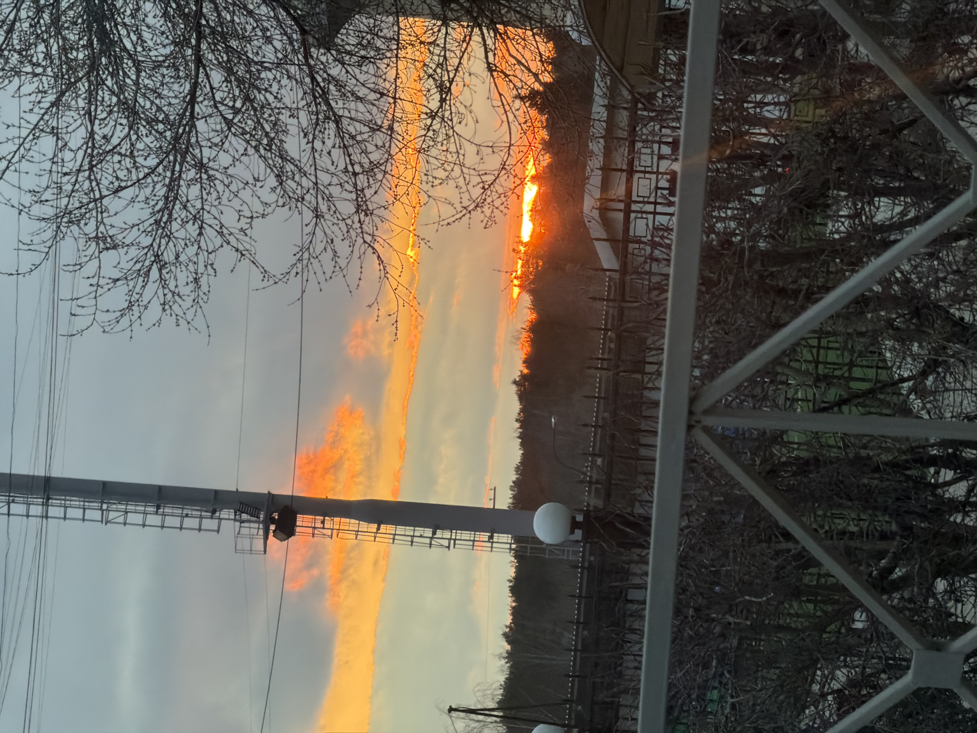 Sunset observed in Perm, Russia with silhouetted infrastructure