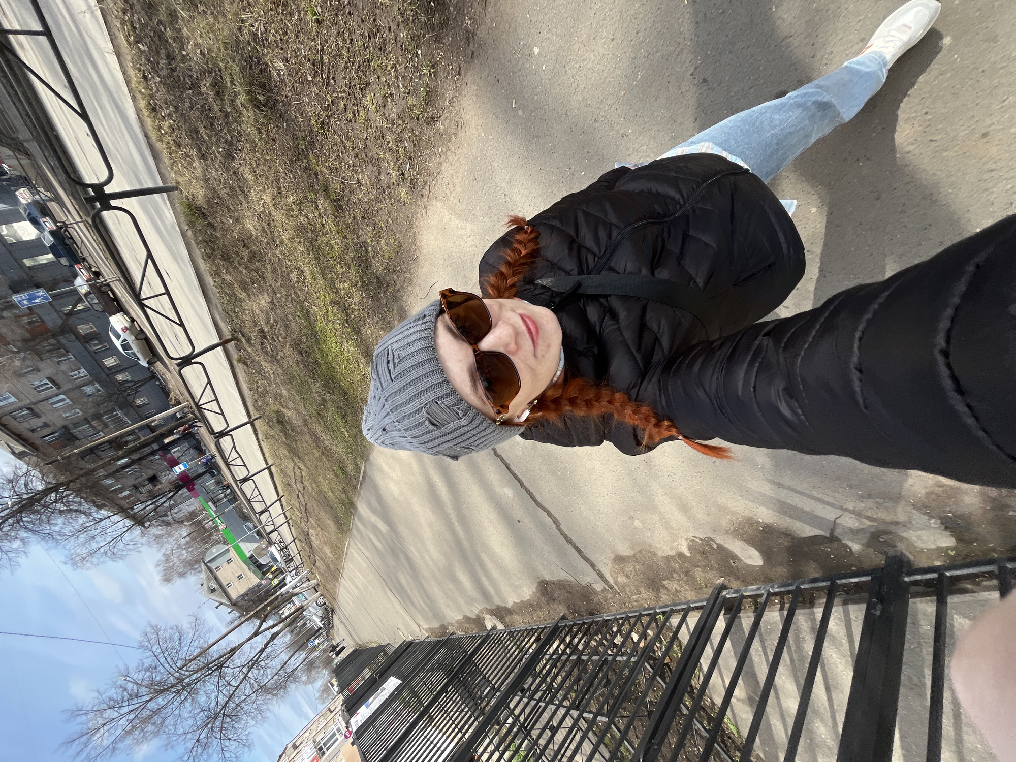 Woman travels through Chaikovsky, Russia by car early morning