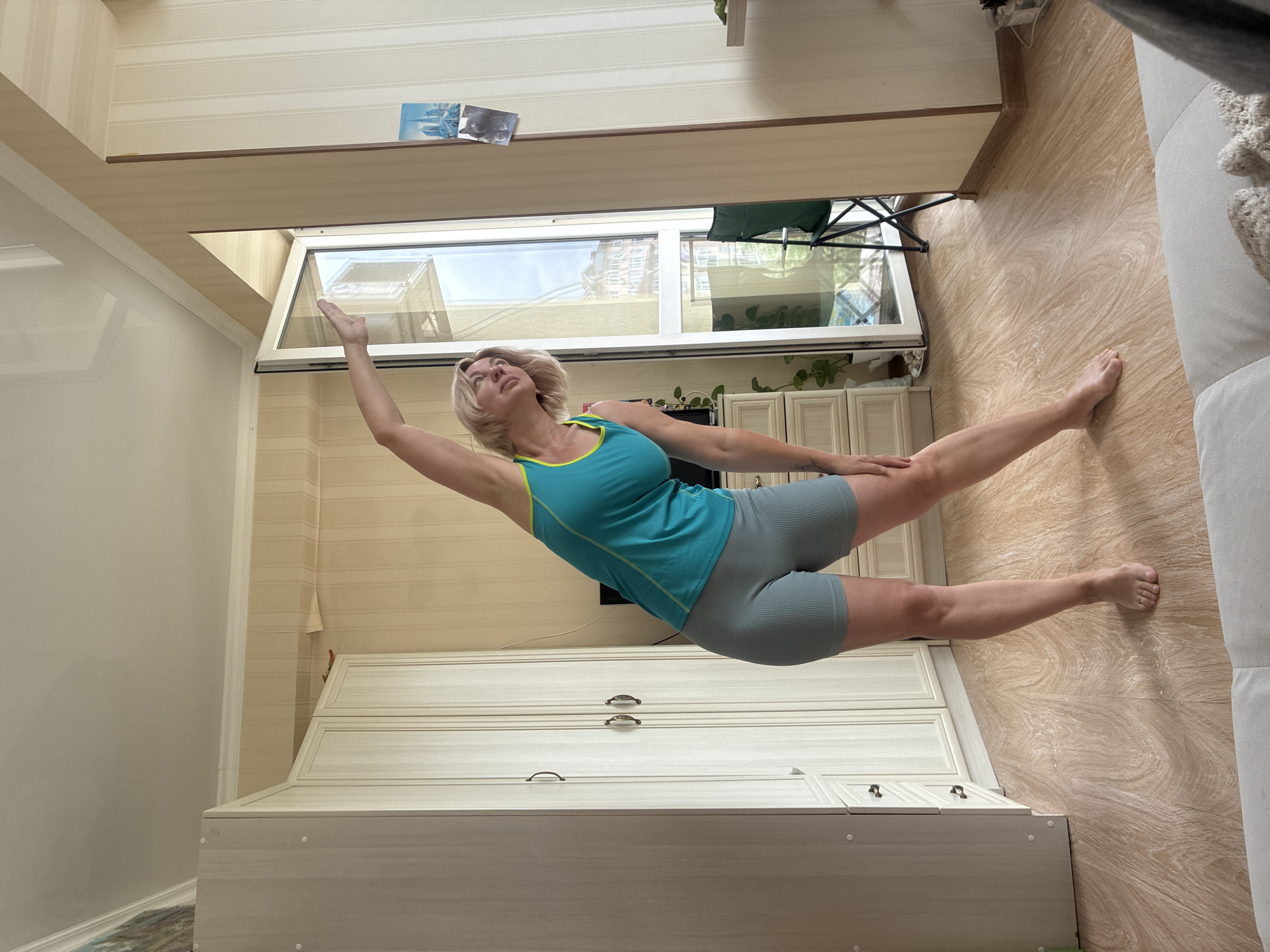 Indoor fitness routine with hula hoop and yoga in Sochi