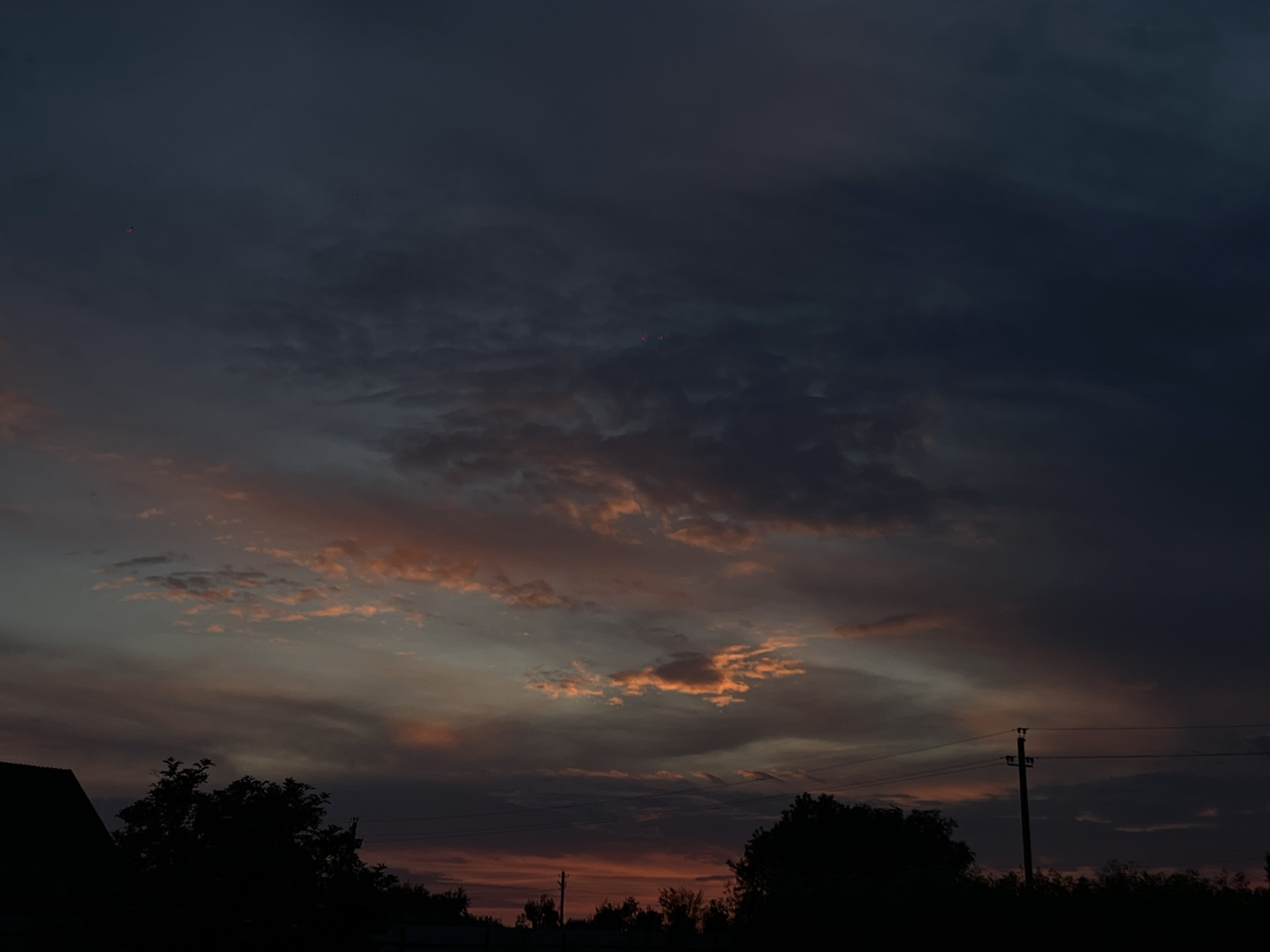 Rural Russian evening documented through twilight skies and local life