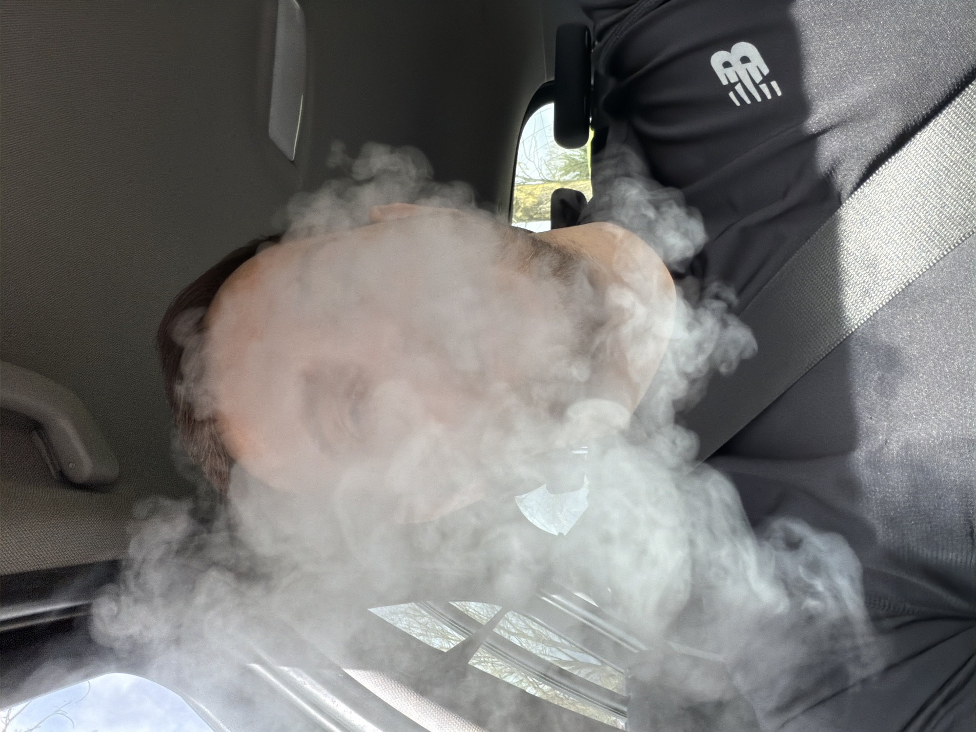 Person vaping in vehicle captured in London