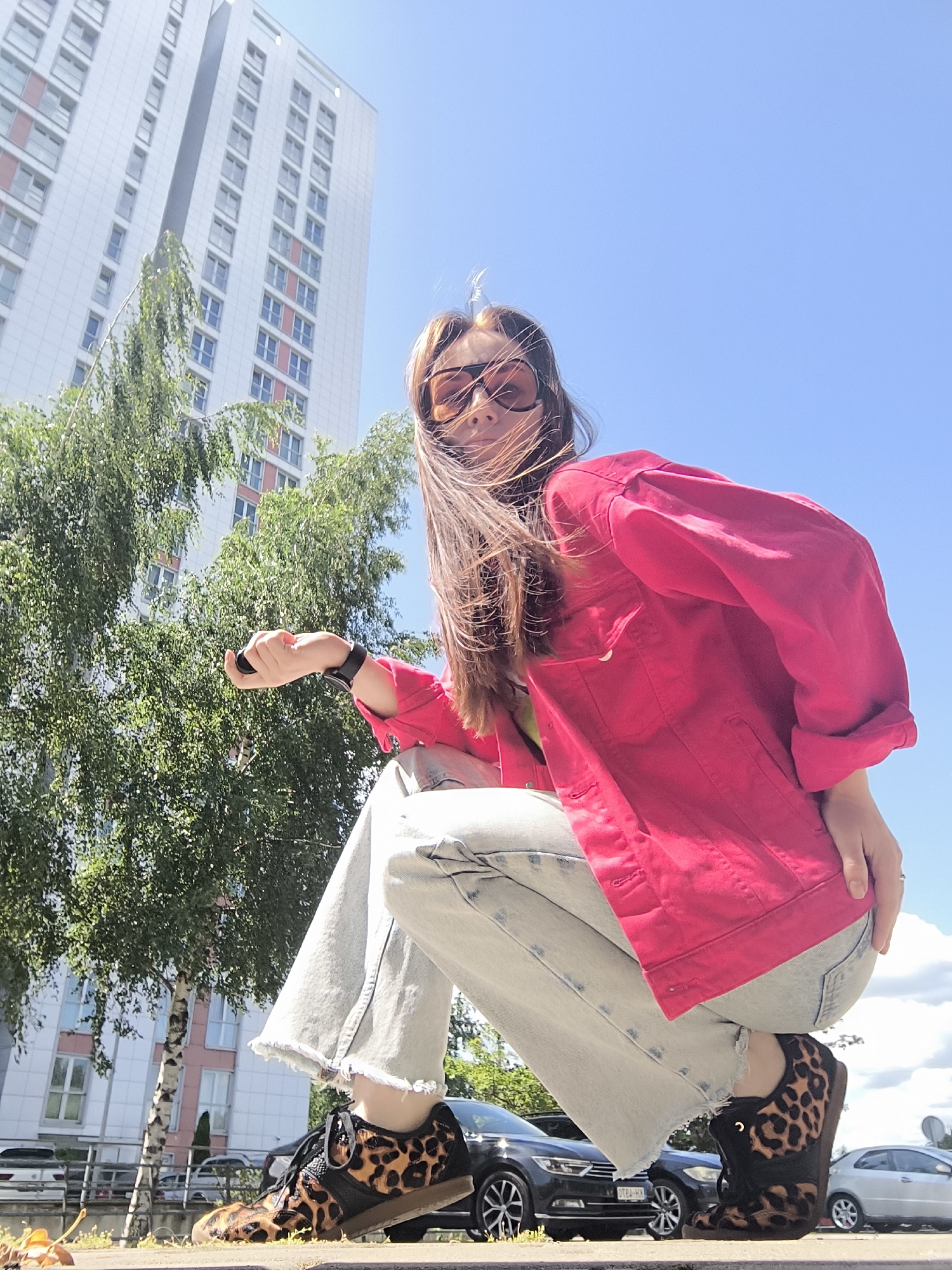 Pink jacket, Riga streets, and a costume contest tag