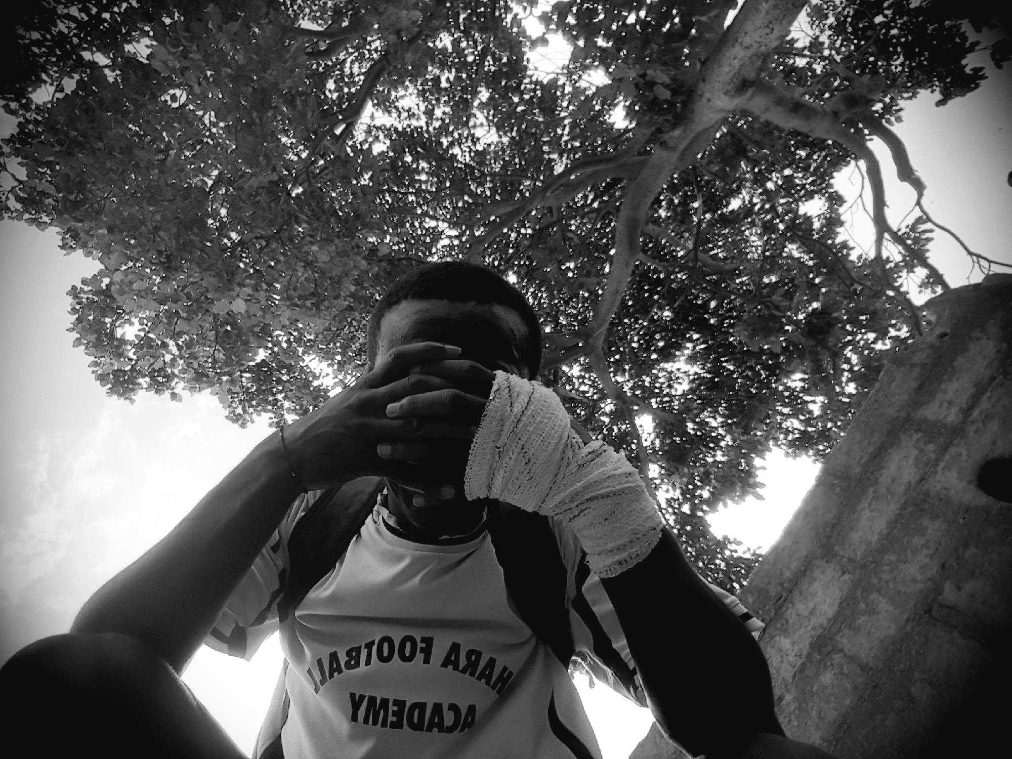 Person photographed making heart gesture in Narayi, Nigeria