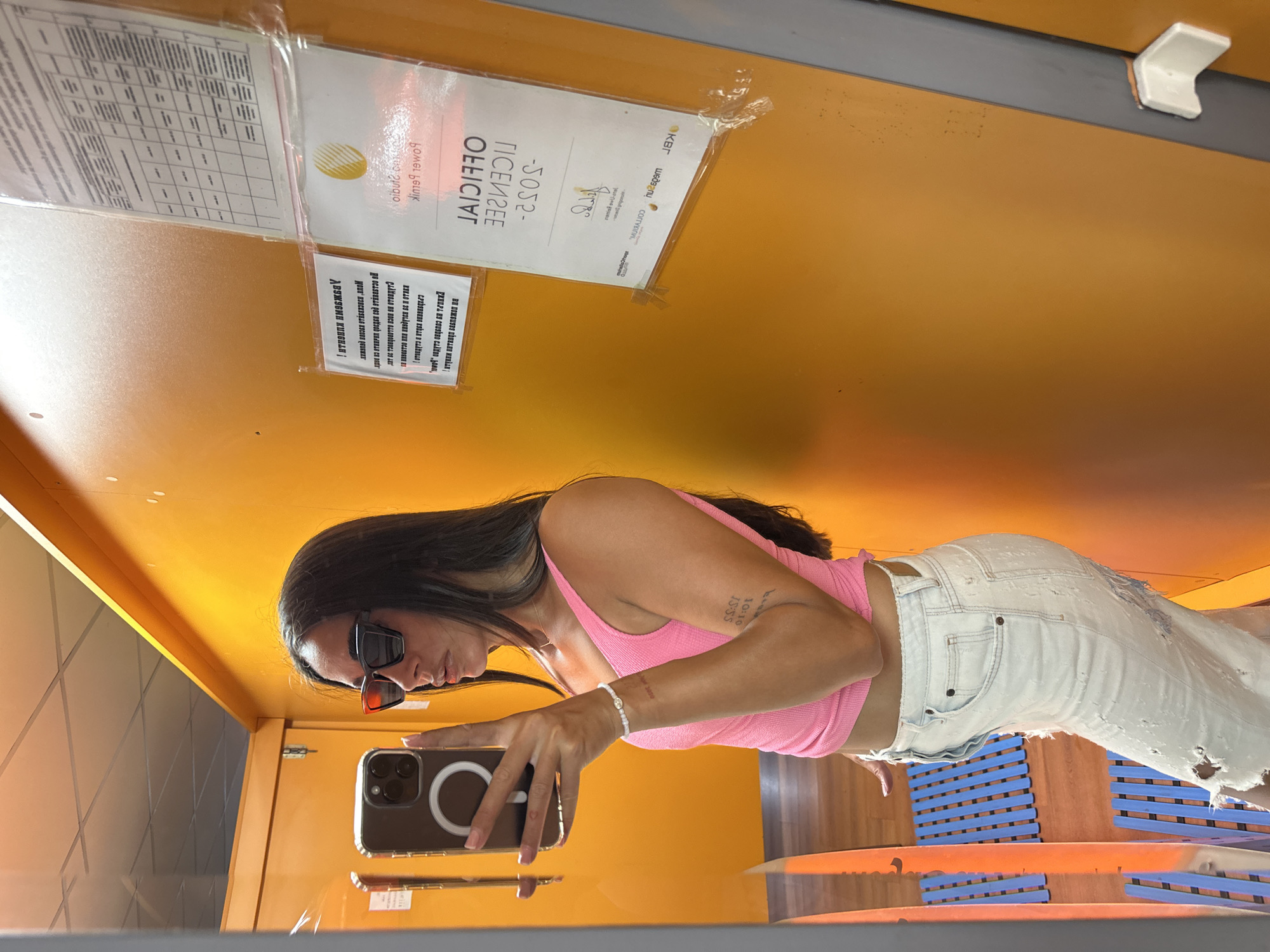 Selfie session at a Pernik tanning salon, July 2026