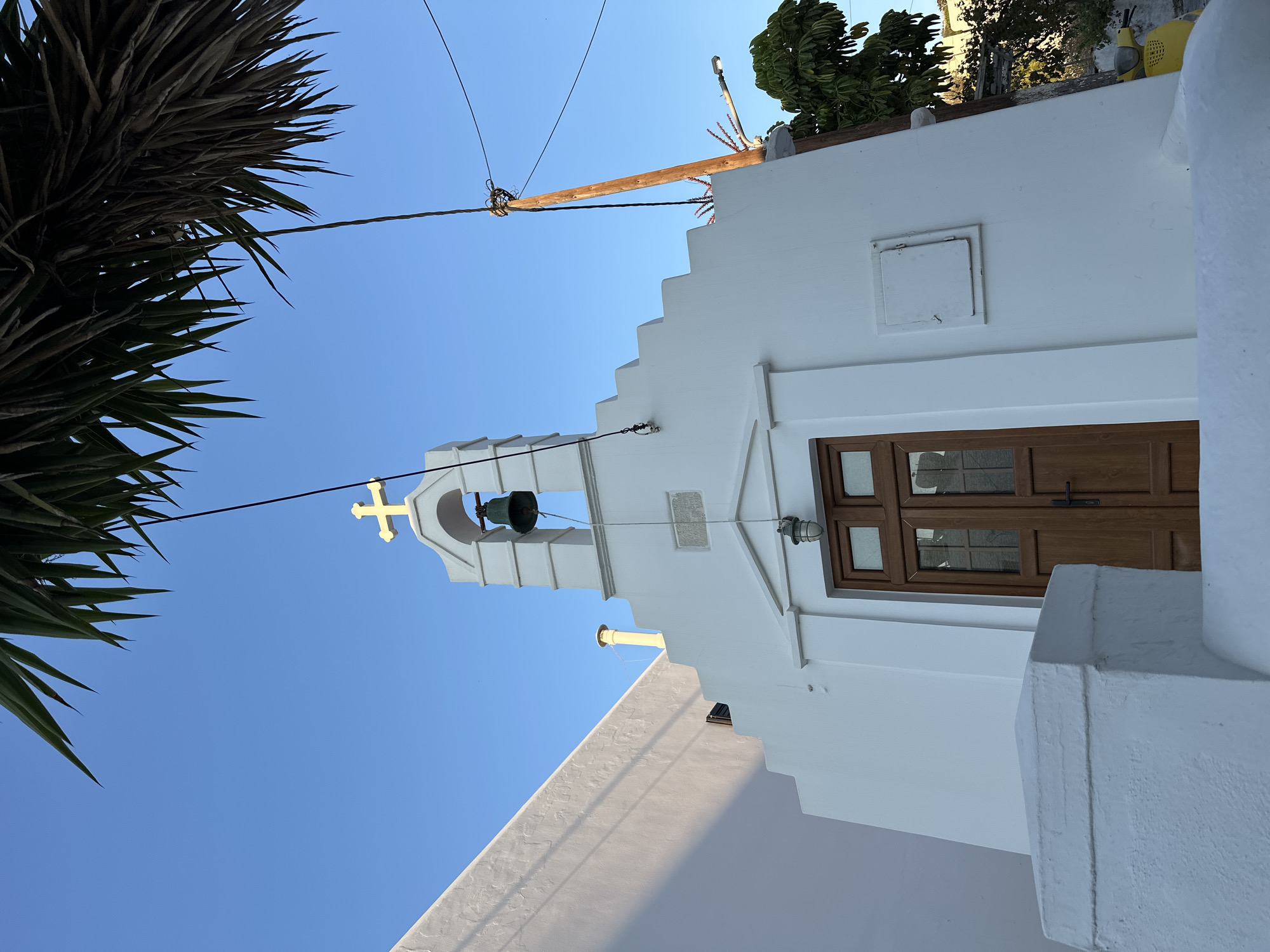 Whitewashed streets and churches in late-afternoon Mykonos