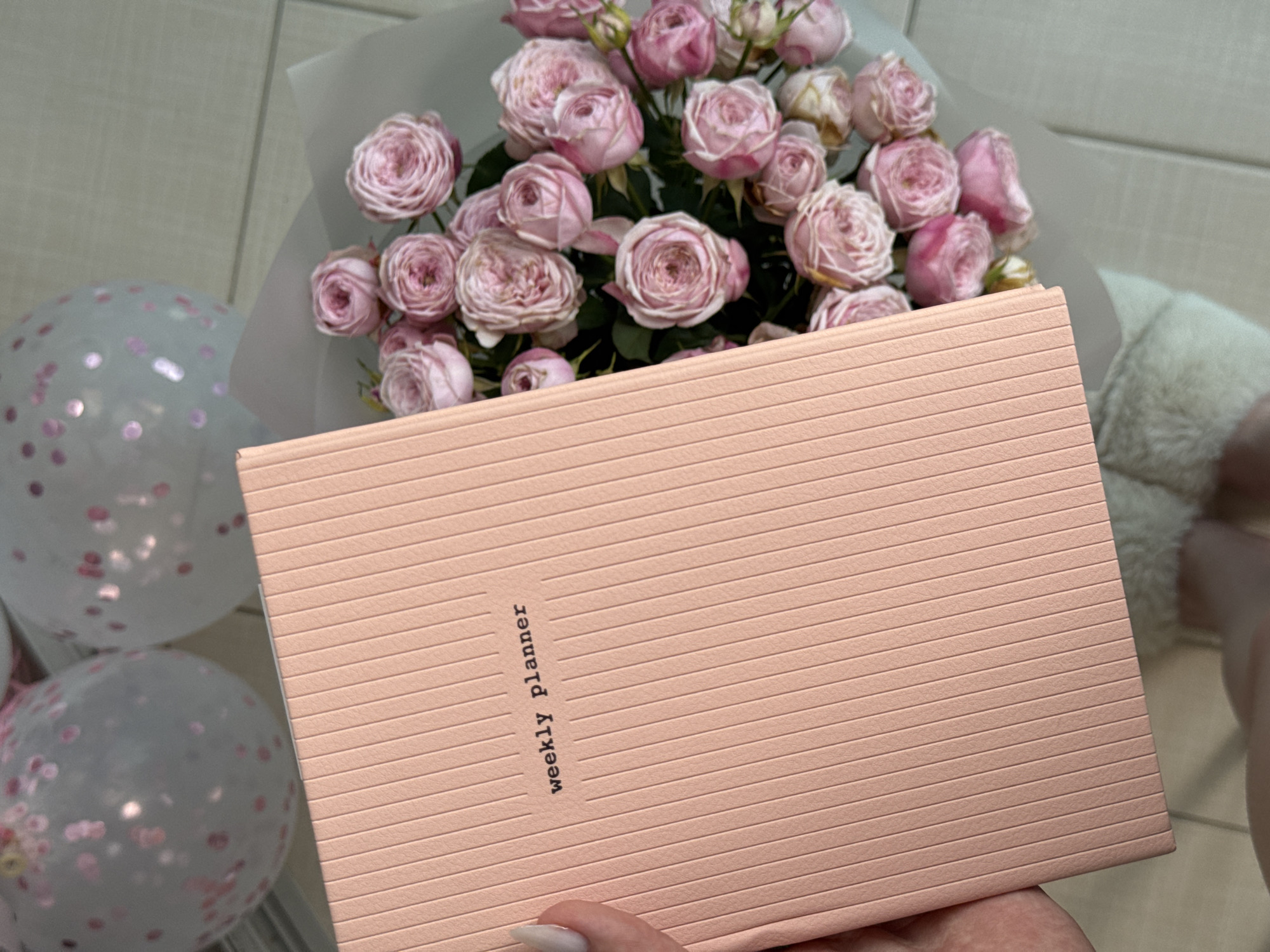 Birthday gift haul with a MacBook, roses, and Marshall speaker
