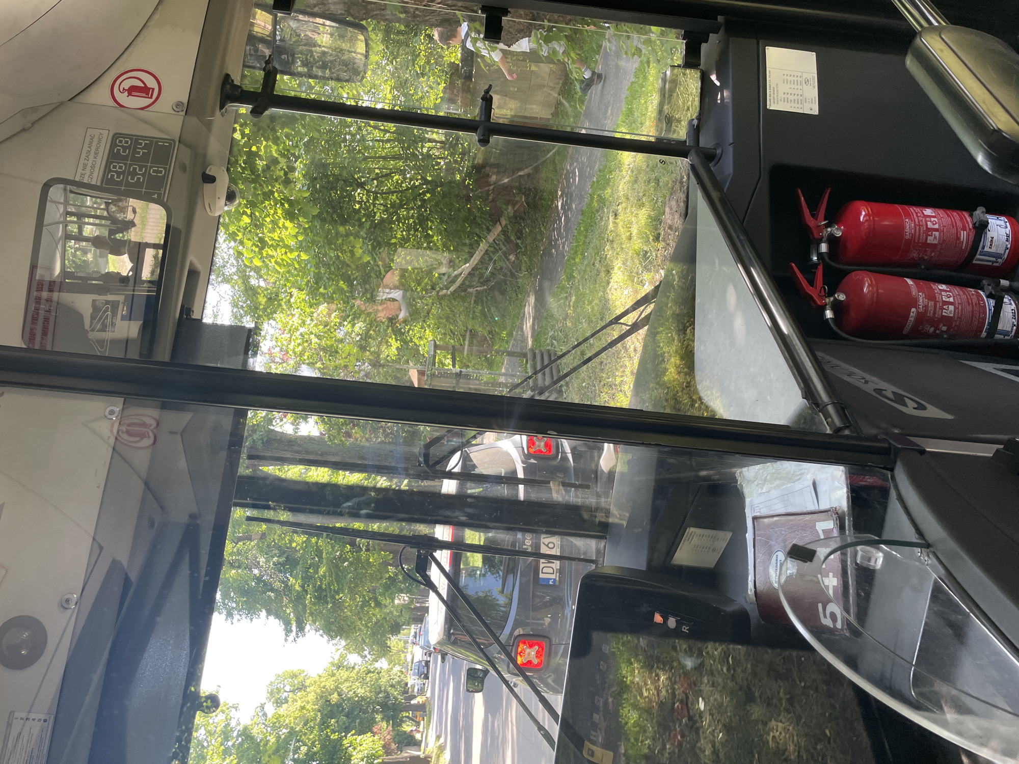 Bus passenger documents routine journey through Wrocław streets