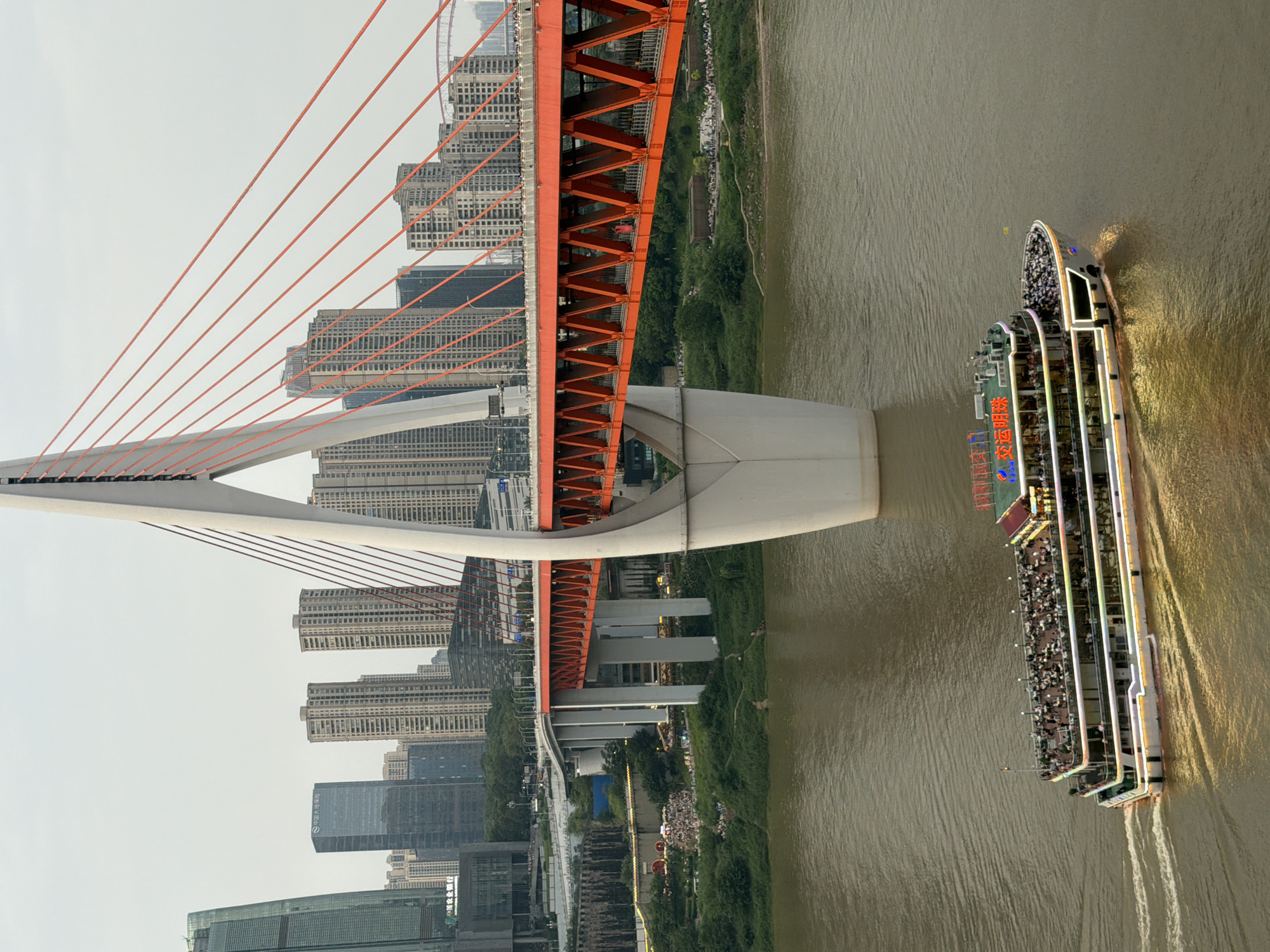 Chongqing's Yuzhong riverfront and city streets, mid-morning