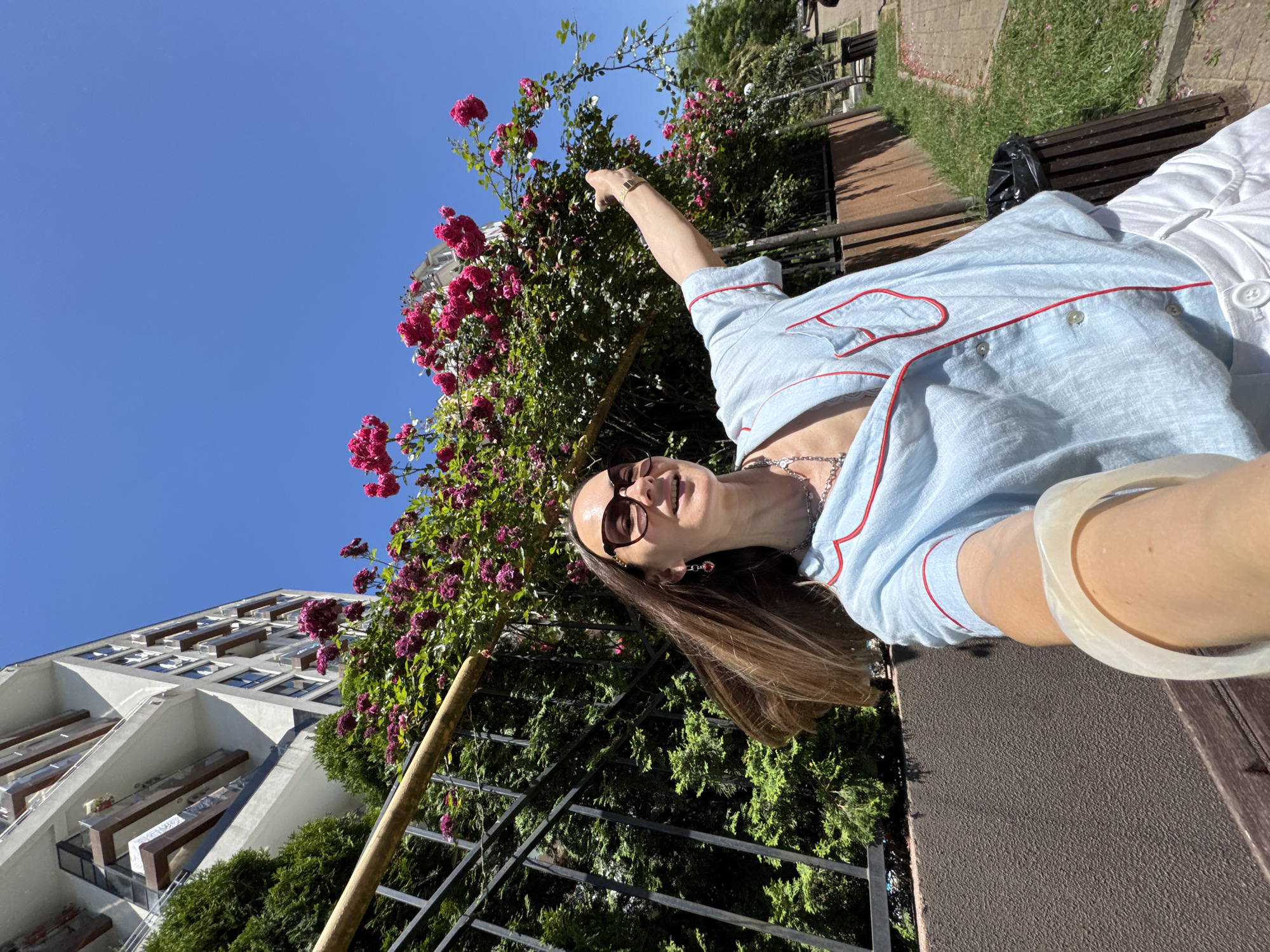 Summer morning at a Sochi residential complex, roses in bloom