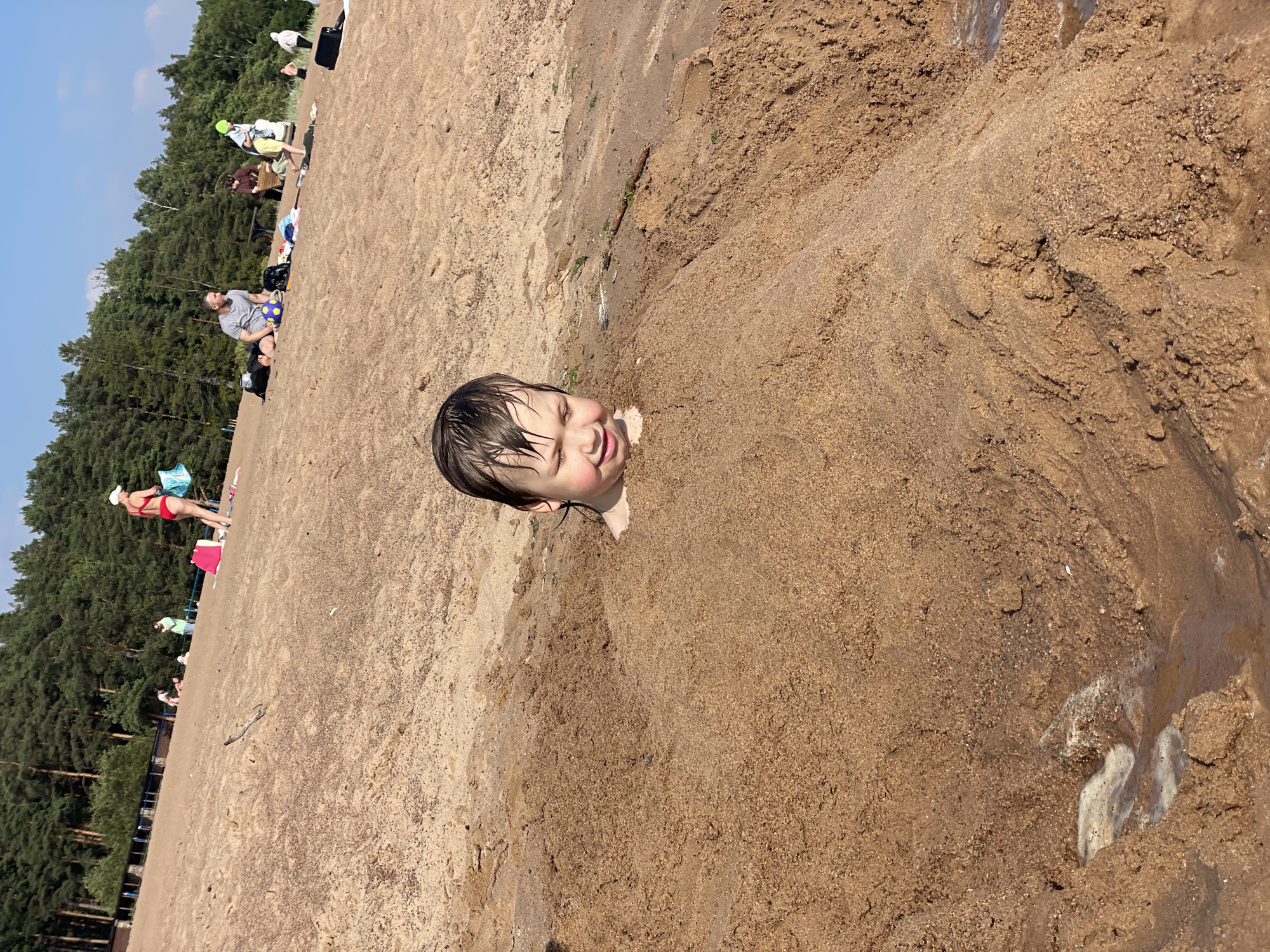Crowded summer beach day at Solnechnoye, Russia