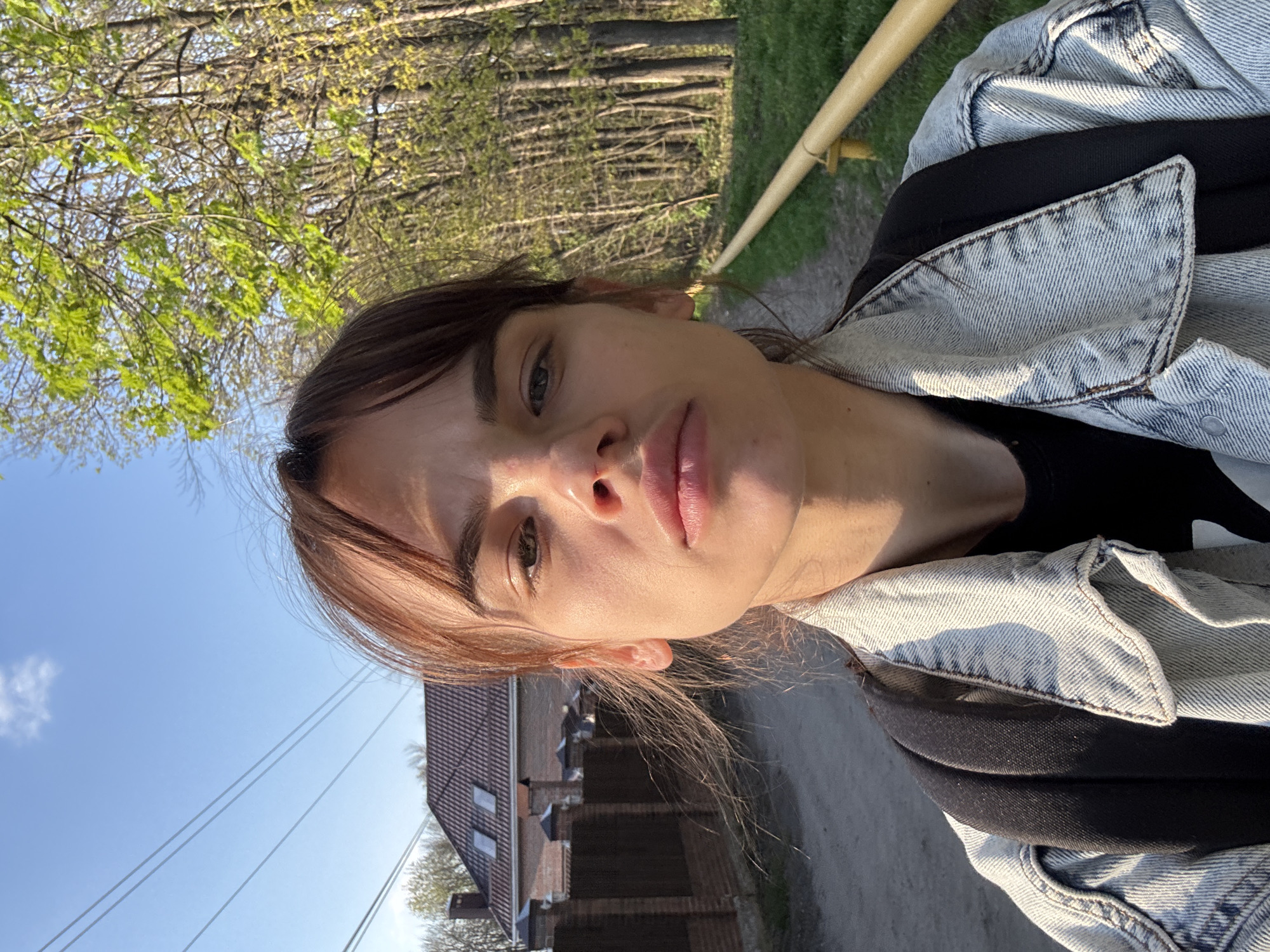 Woman takes selfies in Rostov park, dog spotted nearby