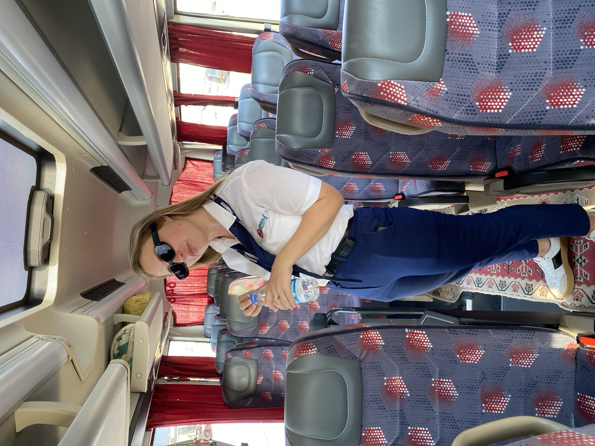 Group transfer through Antalya Airport, bus ride and terminal views