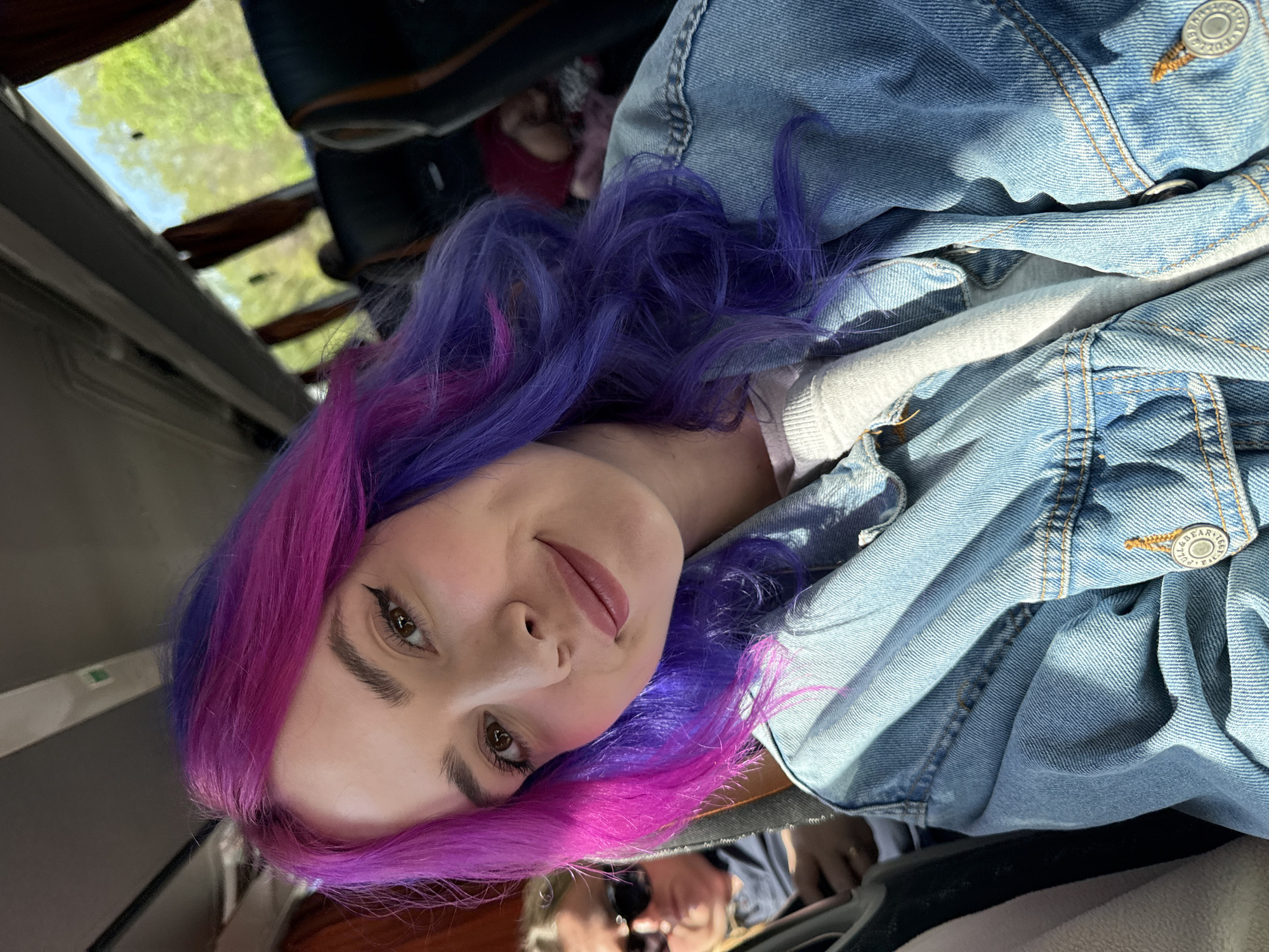 Woman photographed in vehicle interior in Füle, Hungary