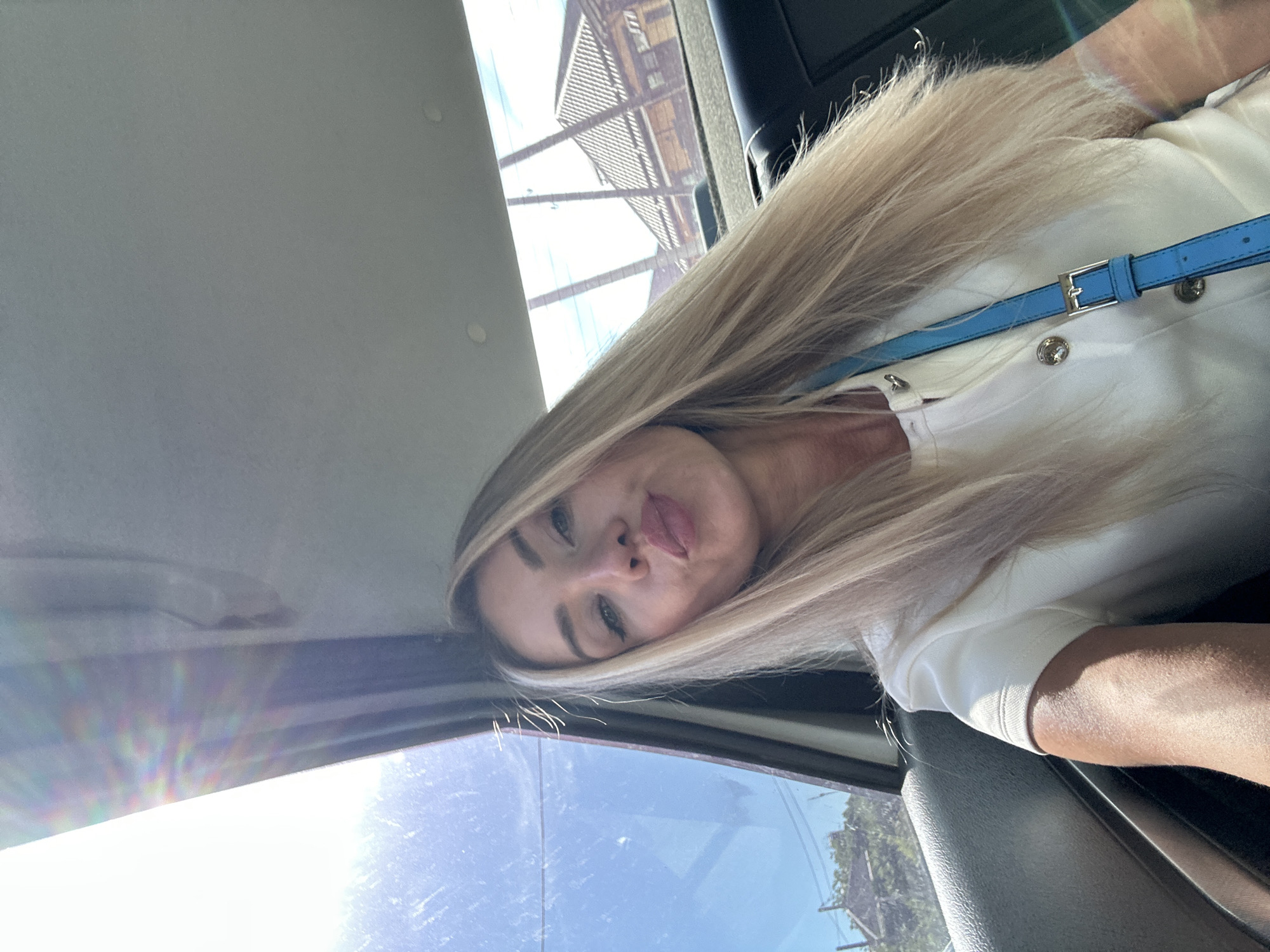 Woman documents afternoon selfie session in Armavir, Russia