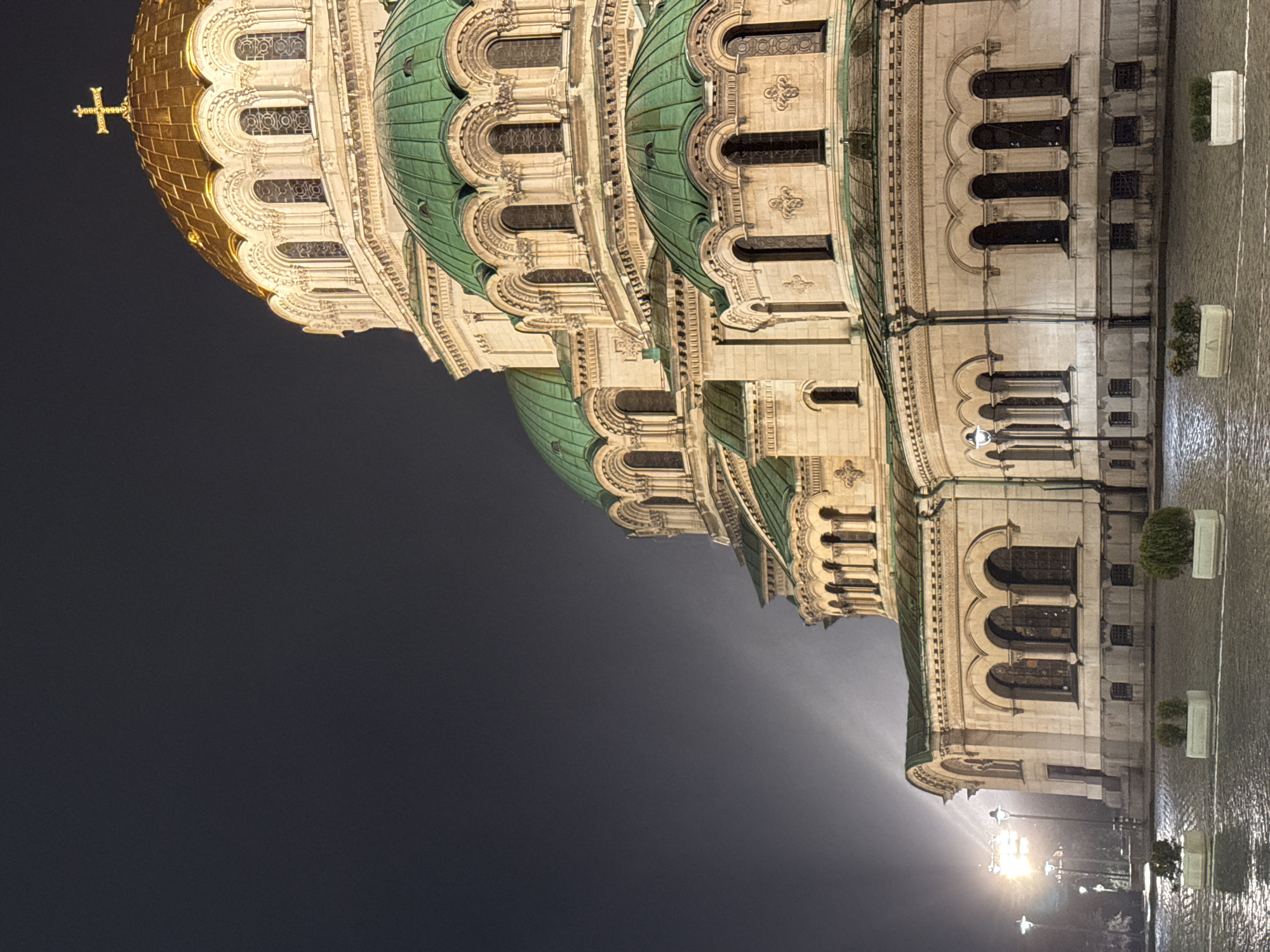 Nighttime drive through Sofia captures illuminated landmarks and streets
