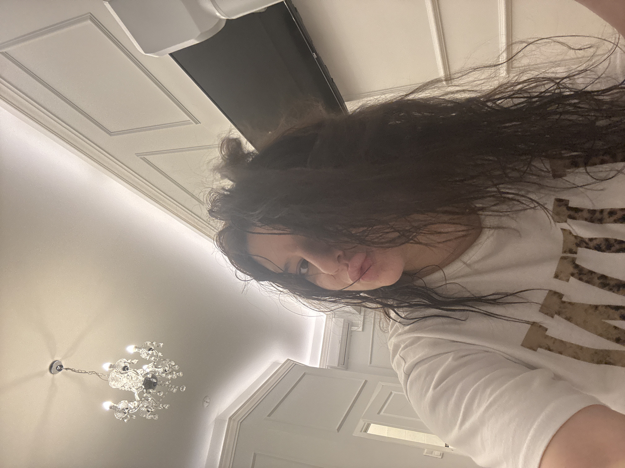 Person takes selfie with damp hair in Krakow