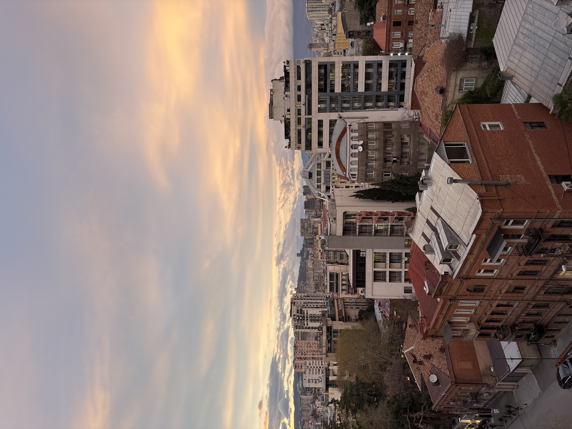 Sunset view captured over Tbilisi cityscape in Georgia