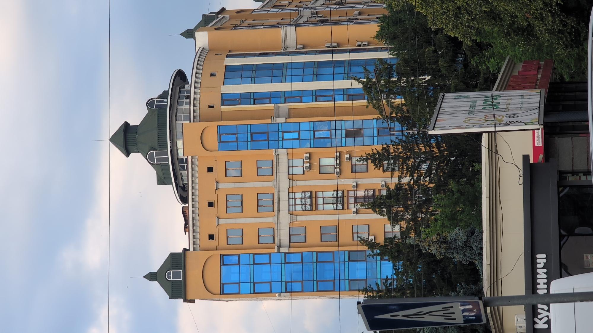 Poltava street scene near a landmark building on a cloudy afternoon