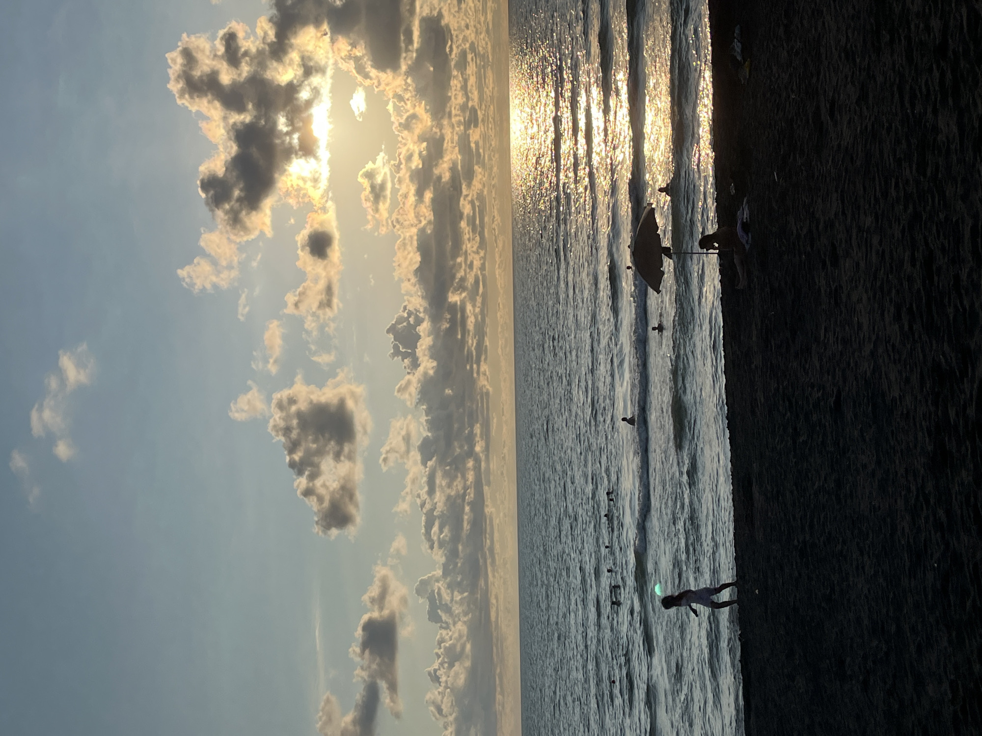 Afternoon on Ureki's black sand beach by bicycle