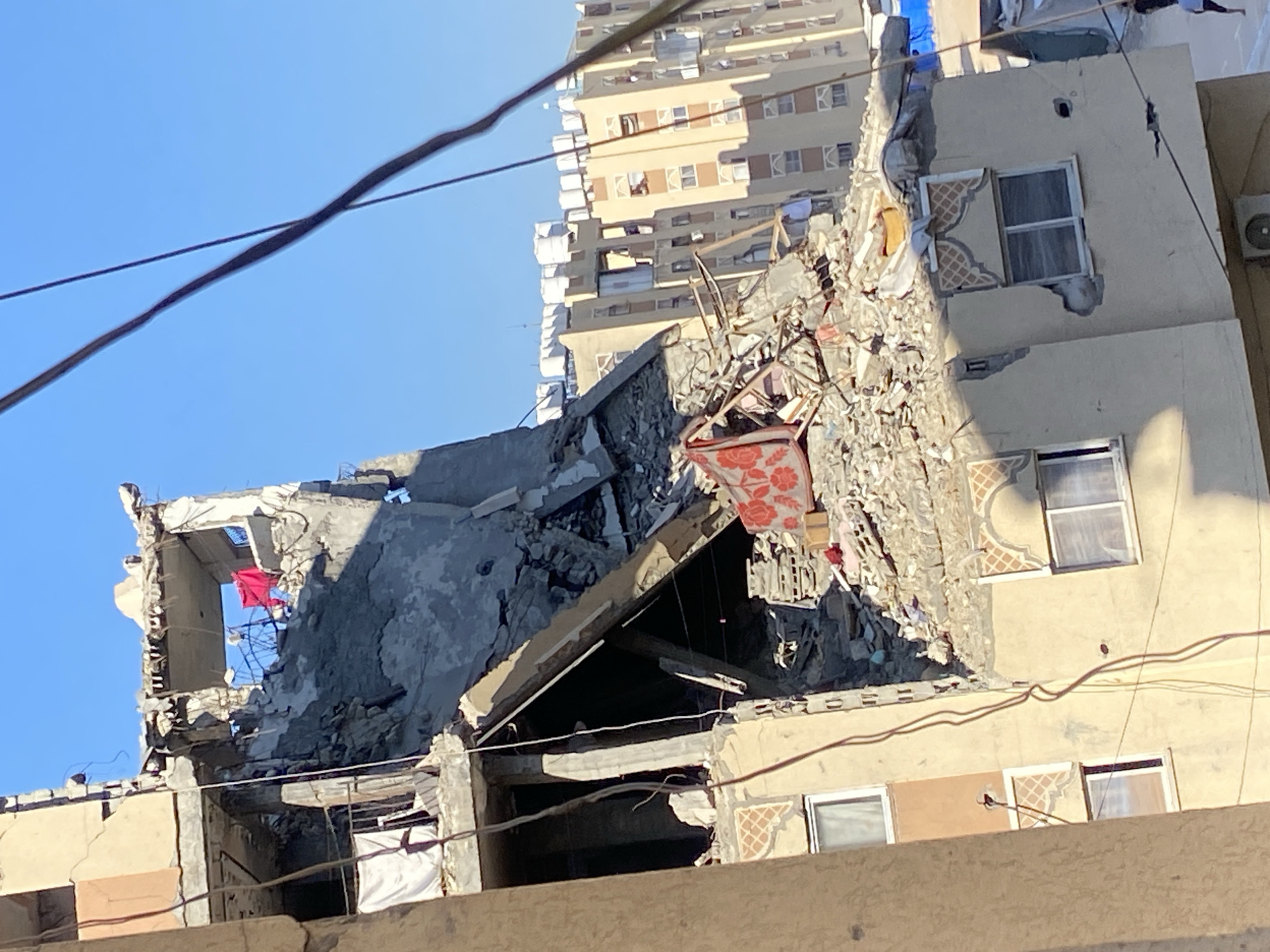 Damaged buildings and displacement camps documented in Khan Yunis