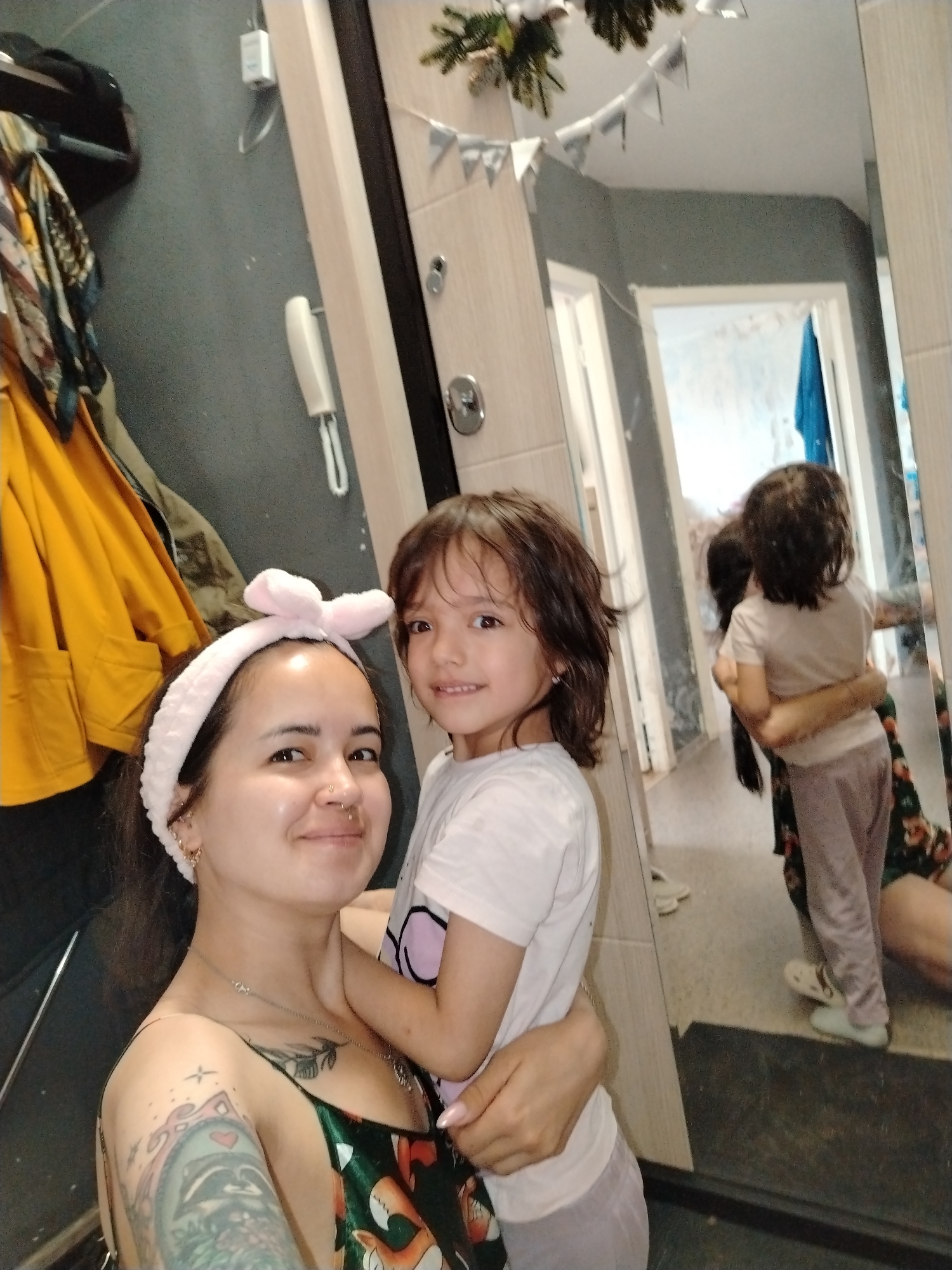 Mirror selfies in a Noviy bathroom, green fox dress and pink headband
