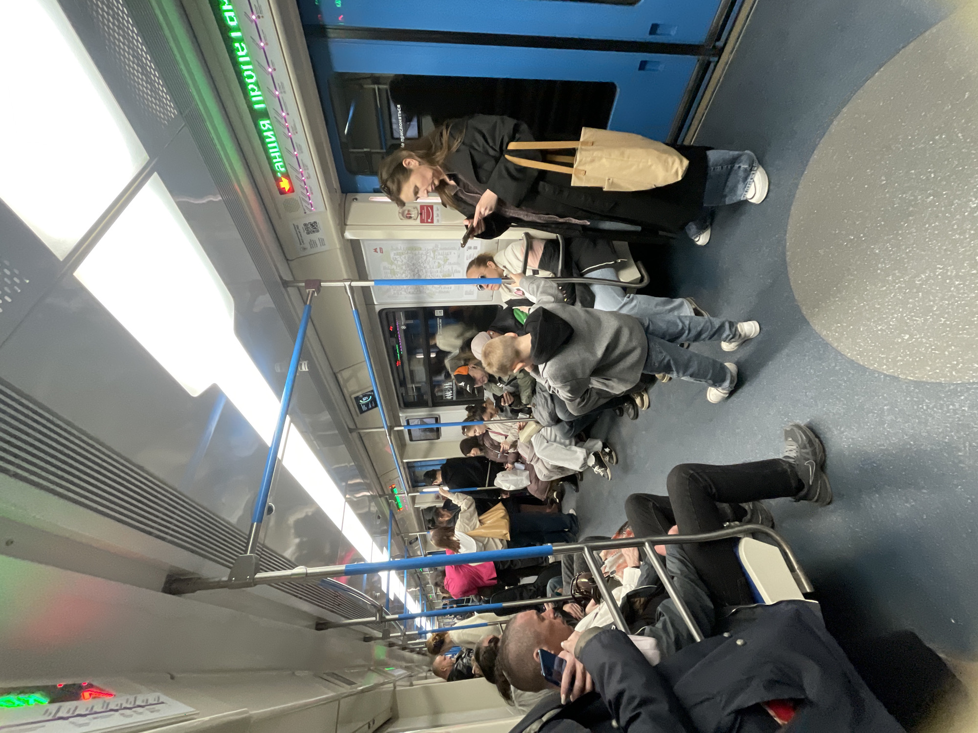 Moscow subway passengers and station scenes documented midday