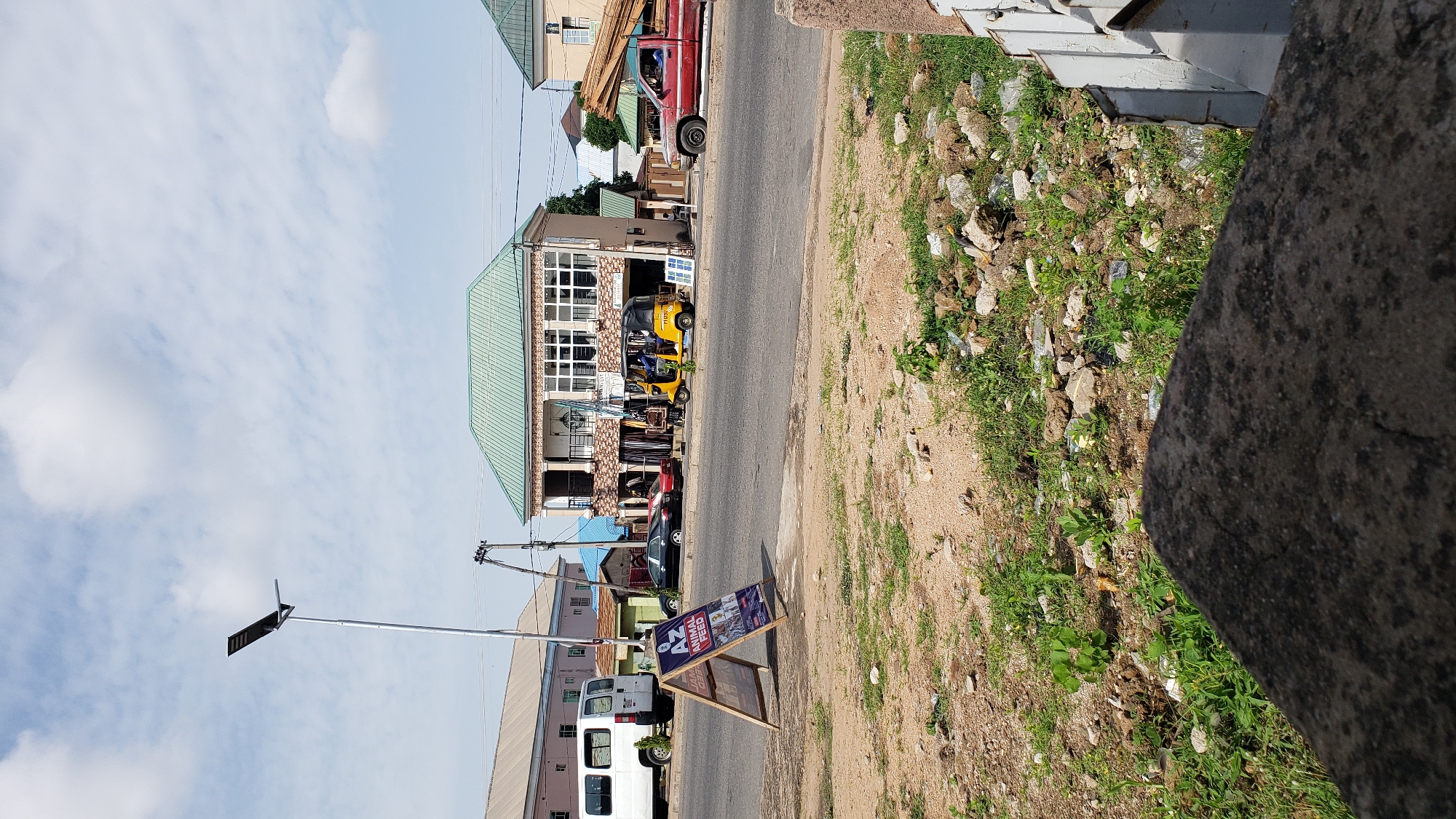 Street, barbershop, and candy shop scenes from Jalingo, Nigeria