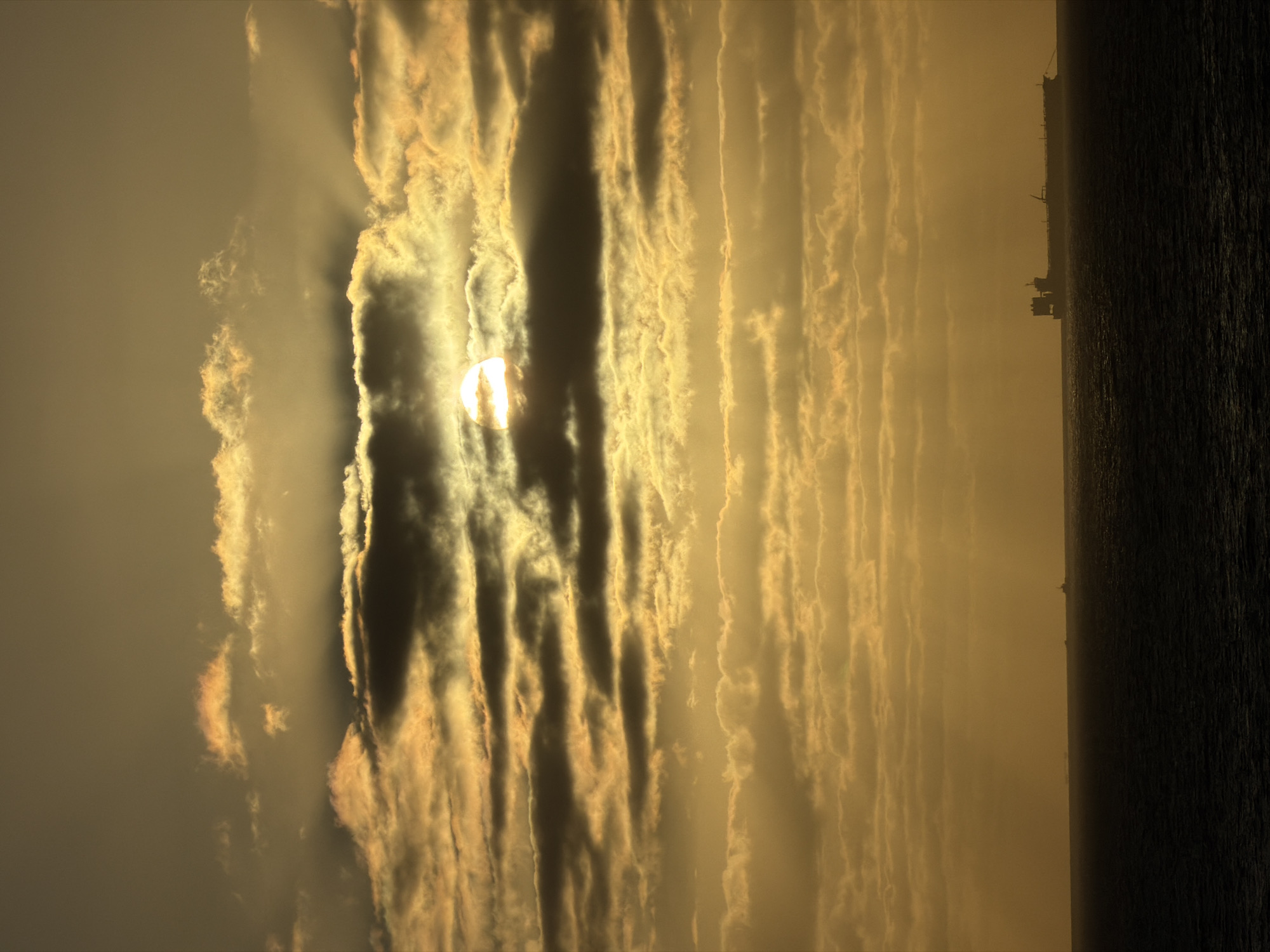Dramatic Gulf sunset with ship silhouette captured by witnesses